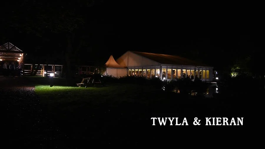 Filmed at night, showing the outside of the marquee.