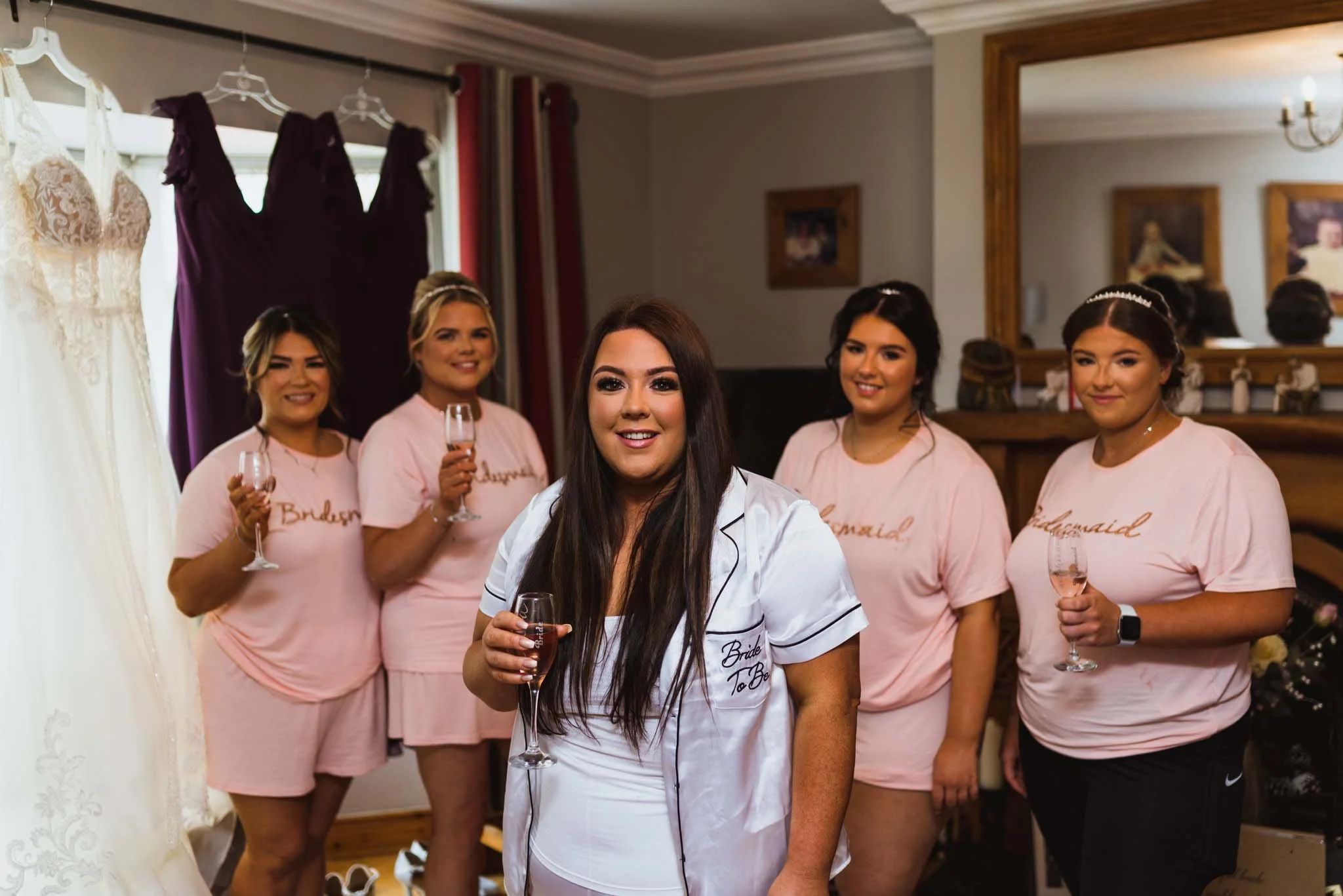 The bride with bridemaids in the family home in Portland Manor, Lurgan, during bridal prep.