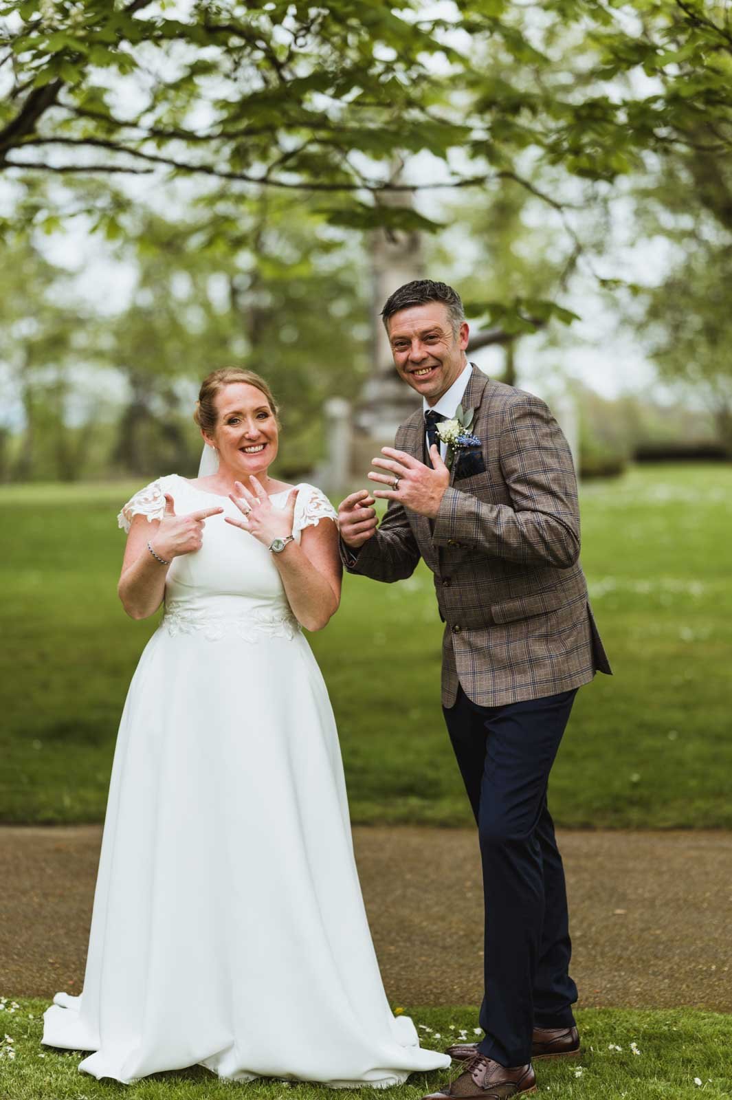 The bride and groom show off their wings.