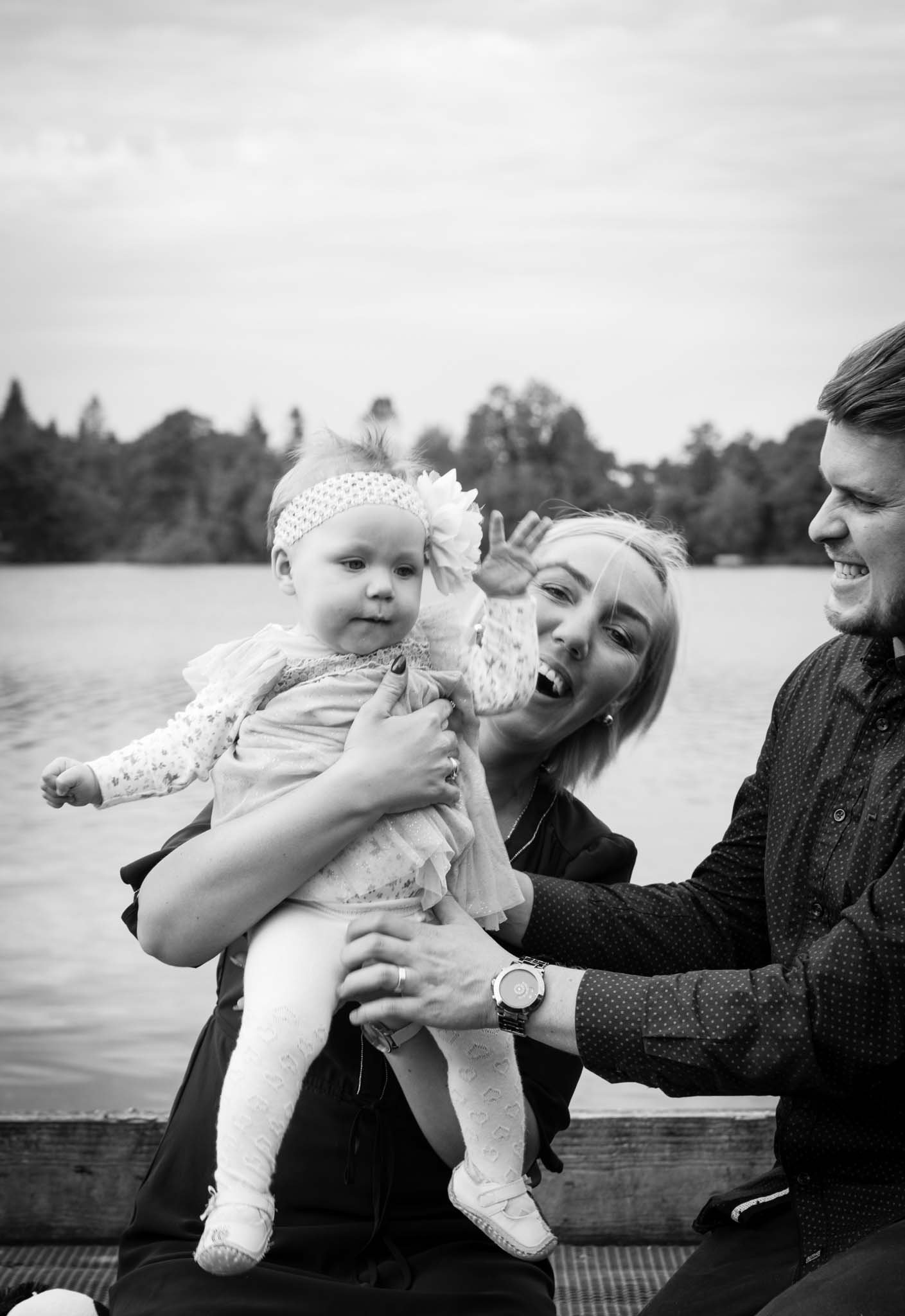 Mono image of mum holding baby.