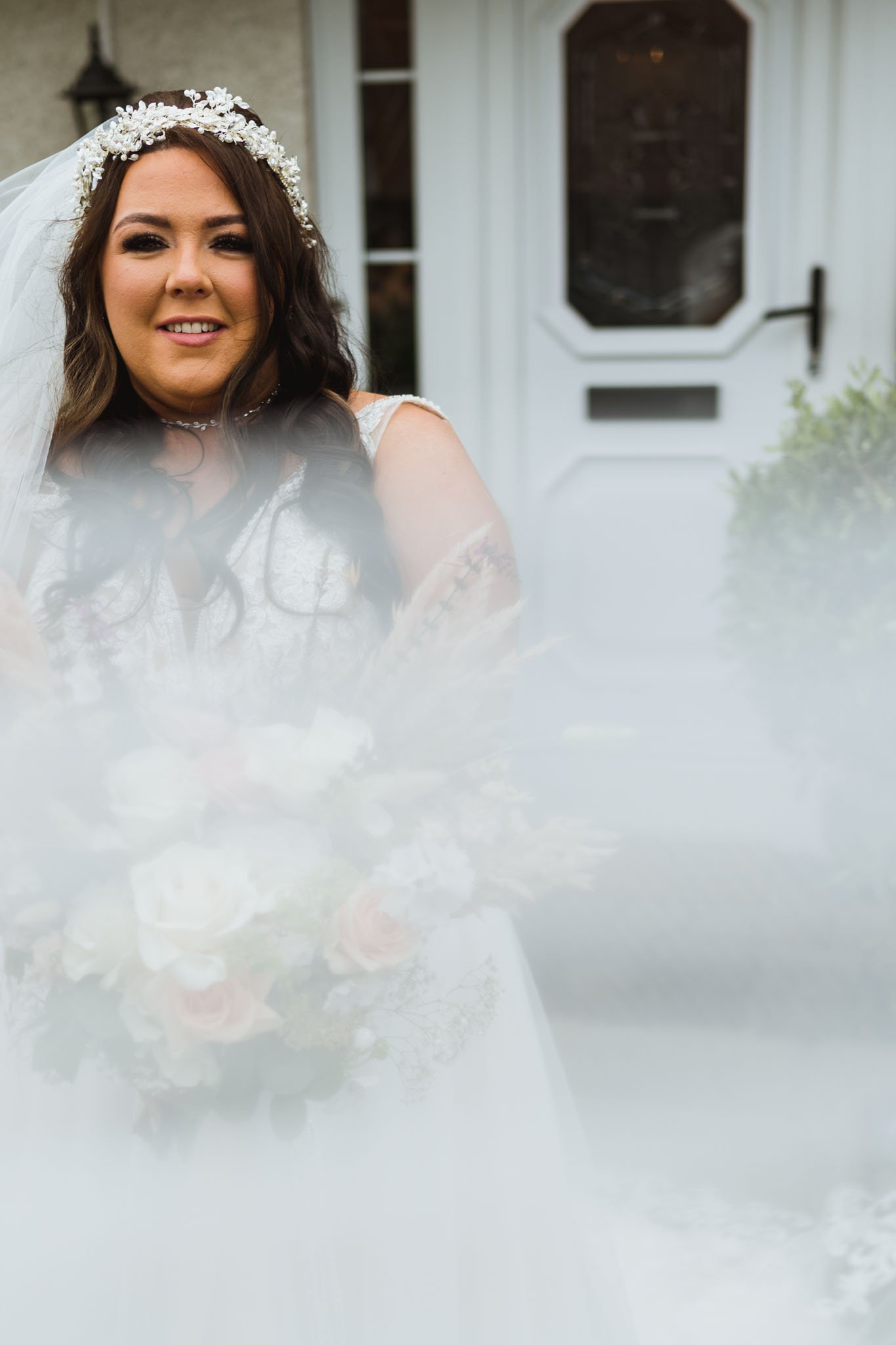 Creative image with a veil blurred out in the foreground.