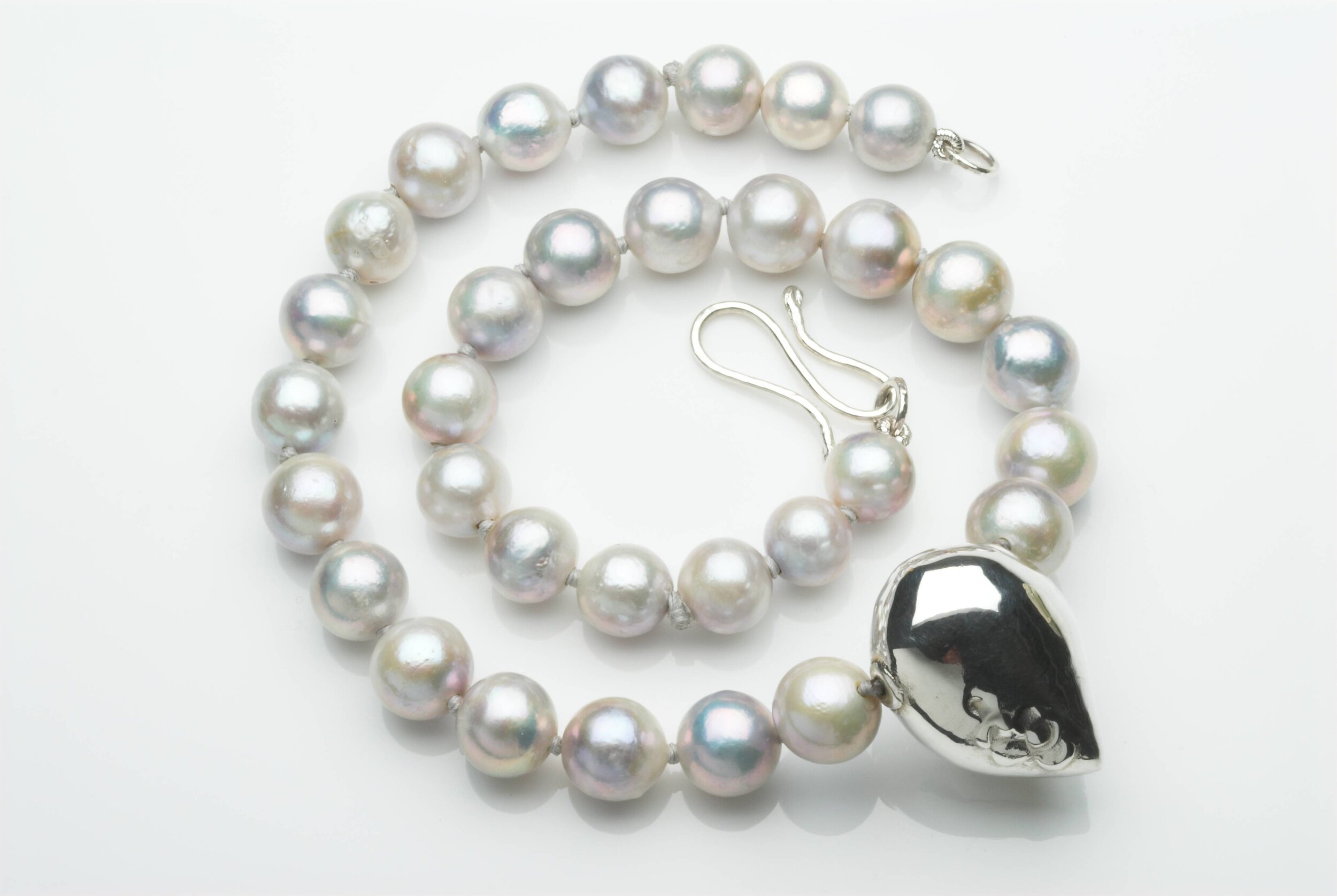 Baroque Pearls with Silver Hallmarked shape.jpg