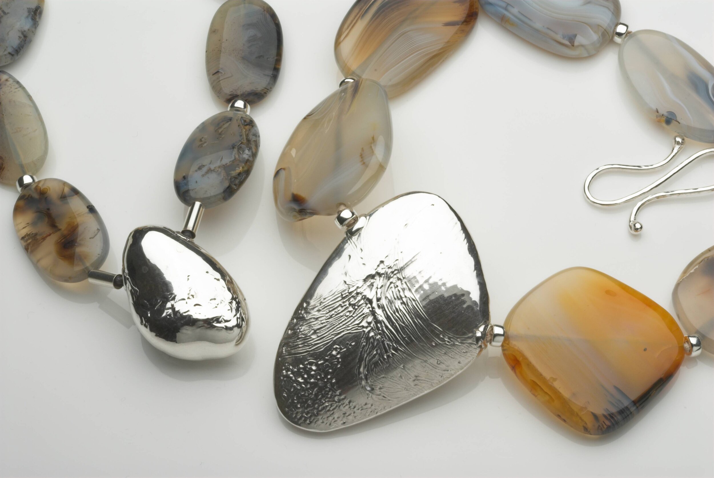 Two golden grey agate Necklaces with hallmarked silver shapes. £560 and £640.jpg