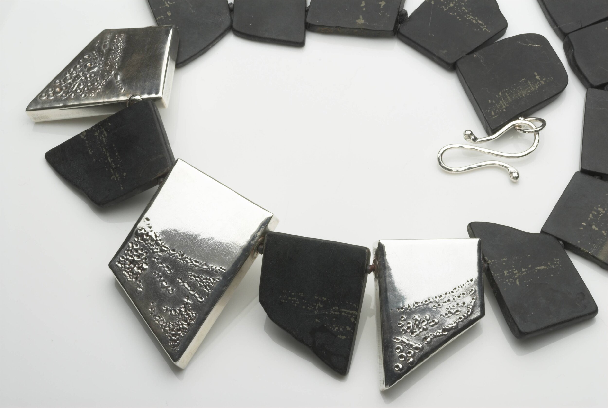 Iron Pyrite and shale stone necklace with 3 silver shapes £1200.jpg