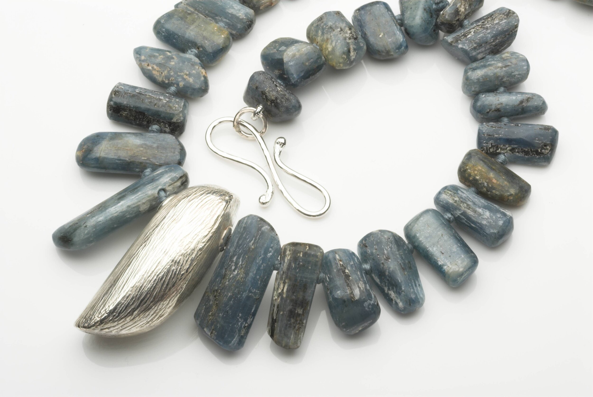 Kyanite bead teeth with textured, hallmarked silver shape £740.jpg