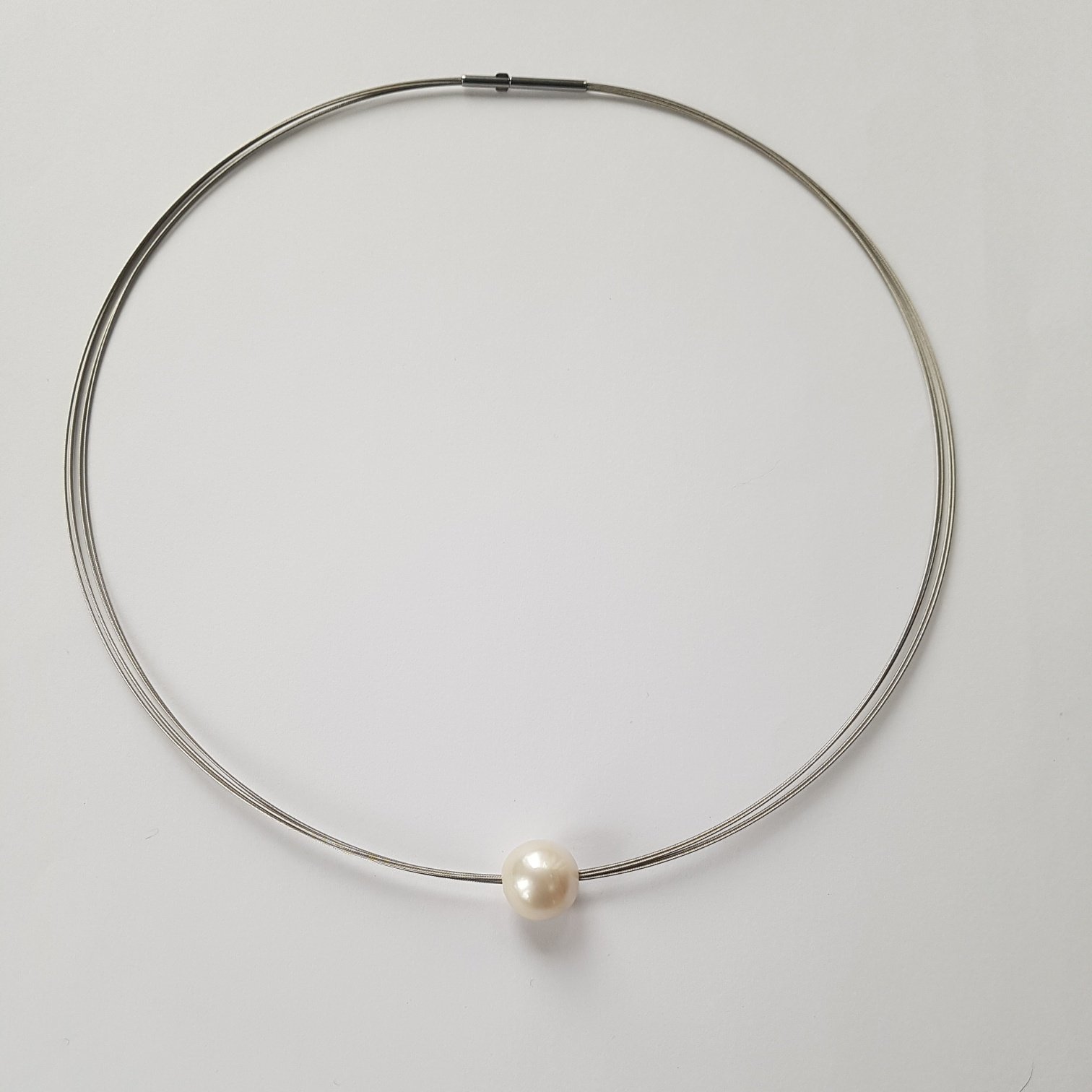 Single White Round Freshwater Pearl on Steel wires