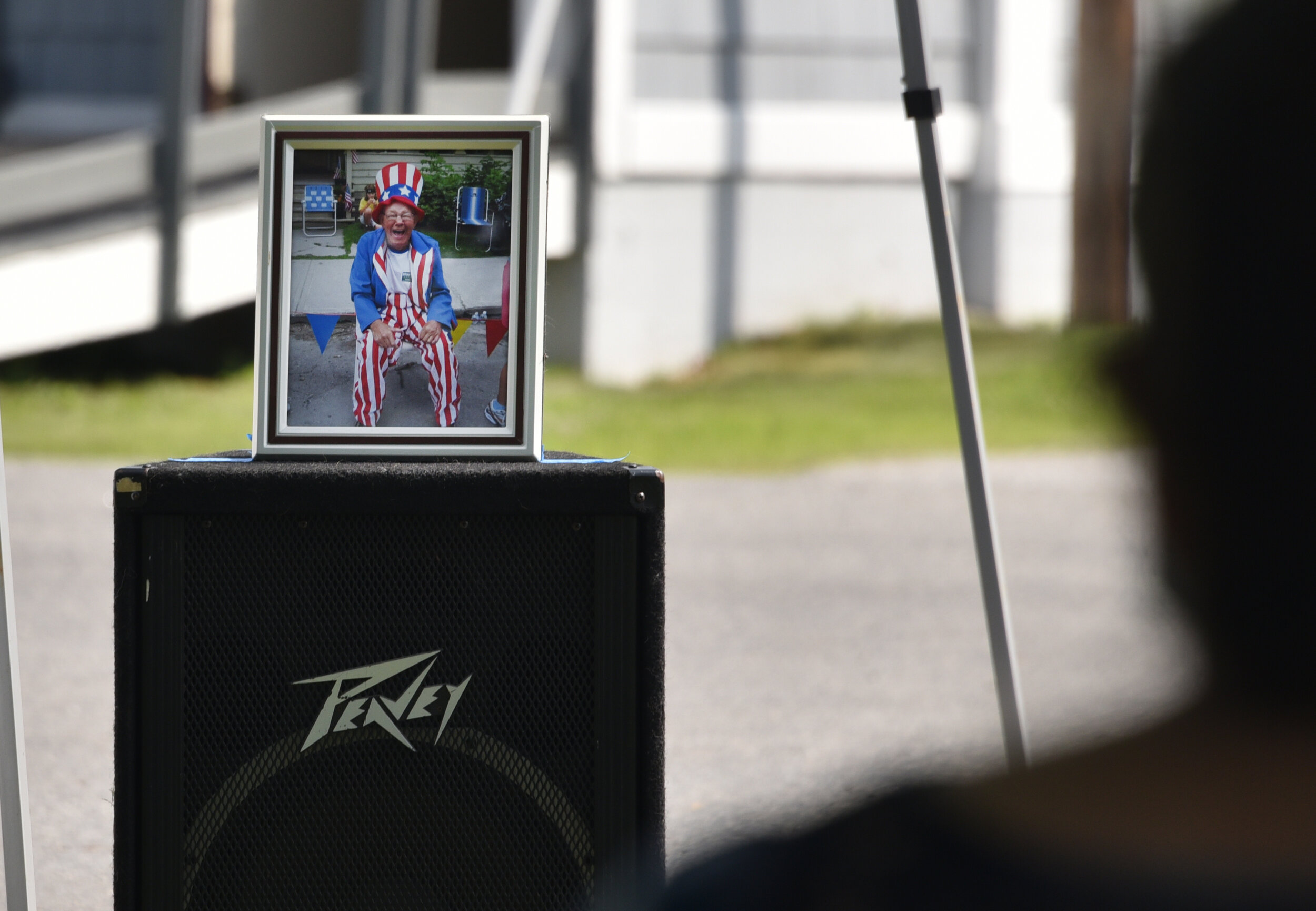   Portrait of George Chilafoux taken by Diana Whitney outside his home at Kirby House one year at Waterbury's Not Quite Independence Day parade. Photo by Gordon Miller.  