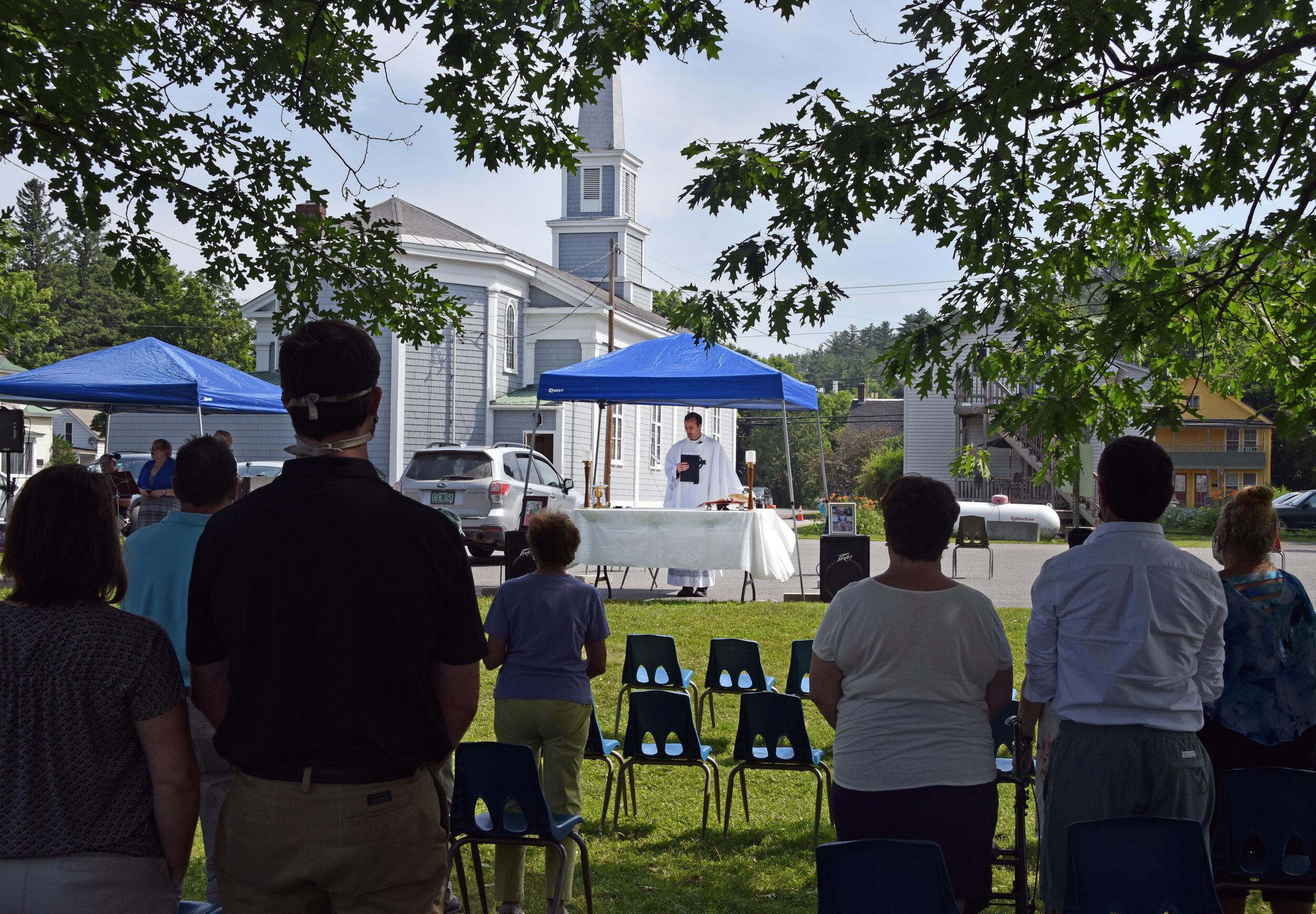   On Tuesday July 7, a memorial mass was held outdoors at St. Andrew's Catholic Church in honor of George Chilafoux who died June 19. Photo by Gordon Miller.  