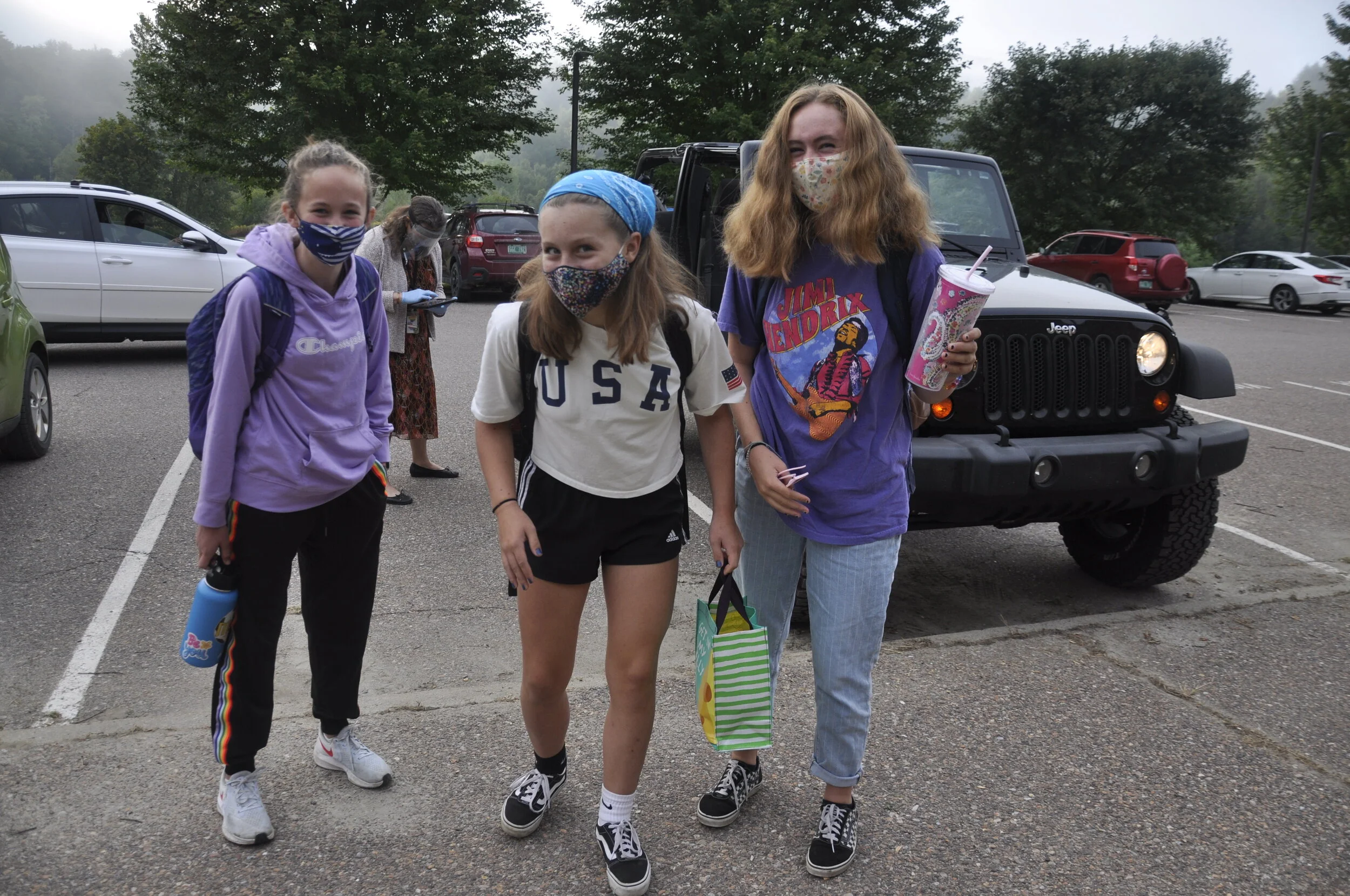   All clear for the first in-person day of eighth grade for Izzy Fish, Ellie Buckingham and Ella McDonough. Photo by Lisa Scagliotti.  