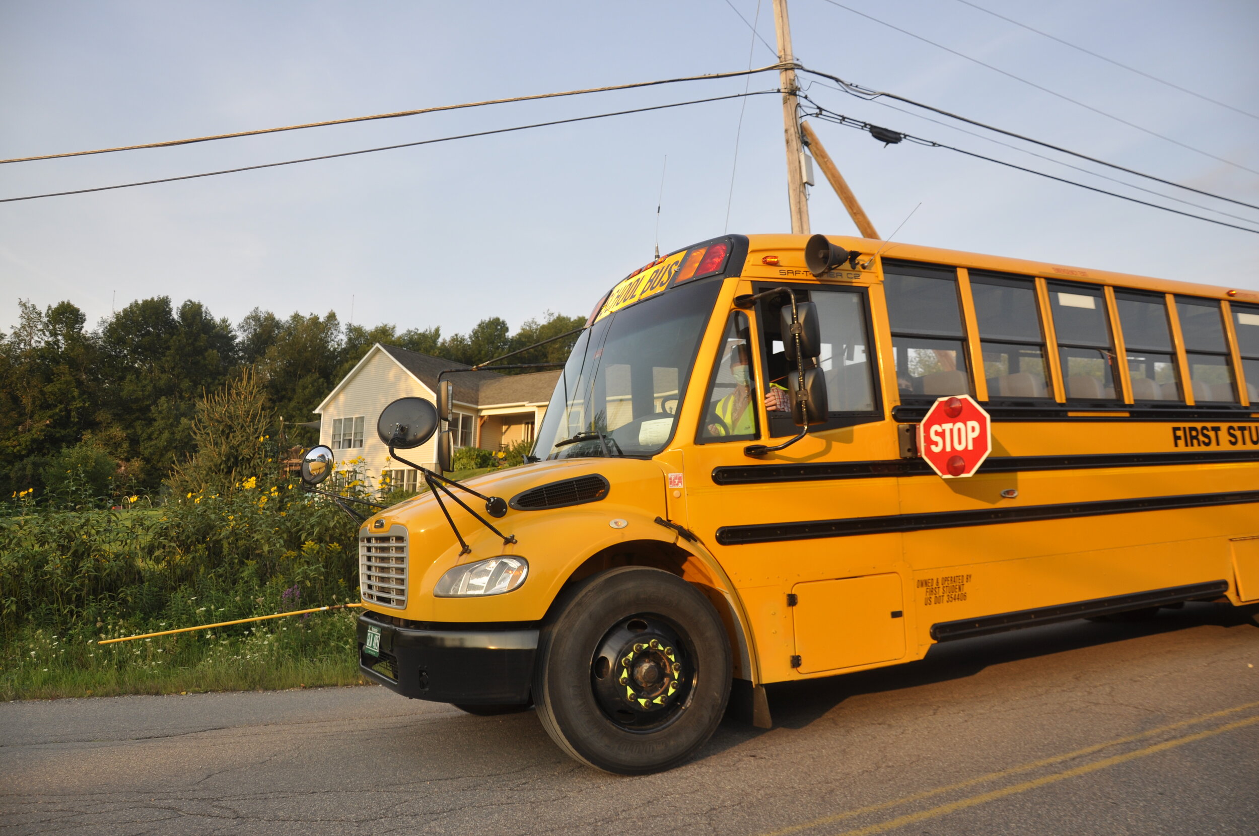   7:15 a.m.: Bus 4 on the Blush Hill Road route picks up just three students and heads to Thatcher Brook Primary School. Photo by Lisa Scagliotti.  