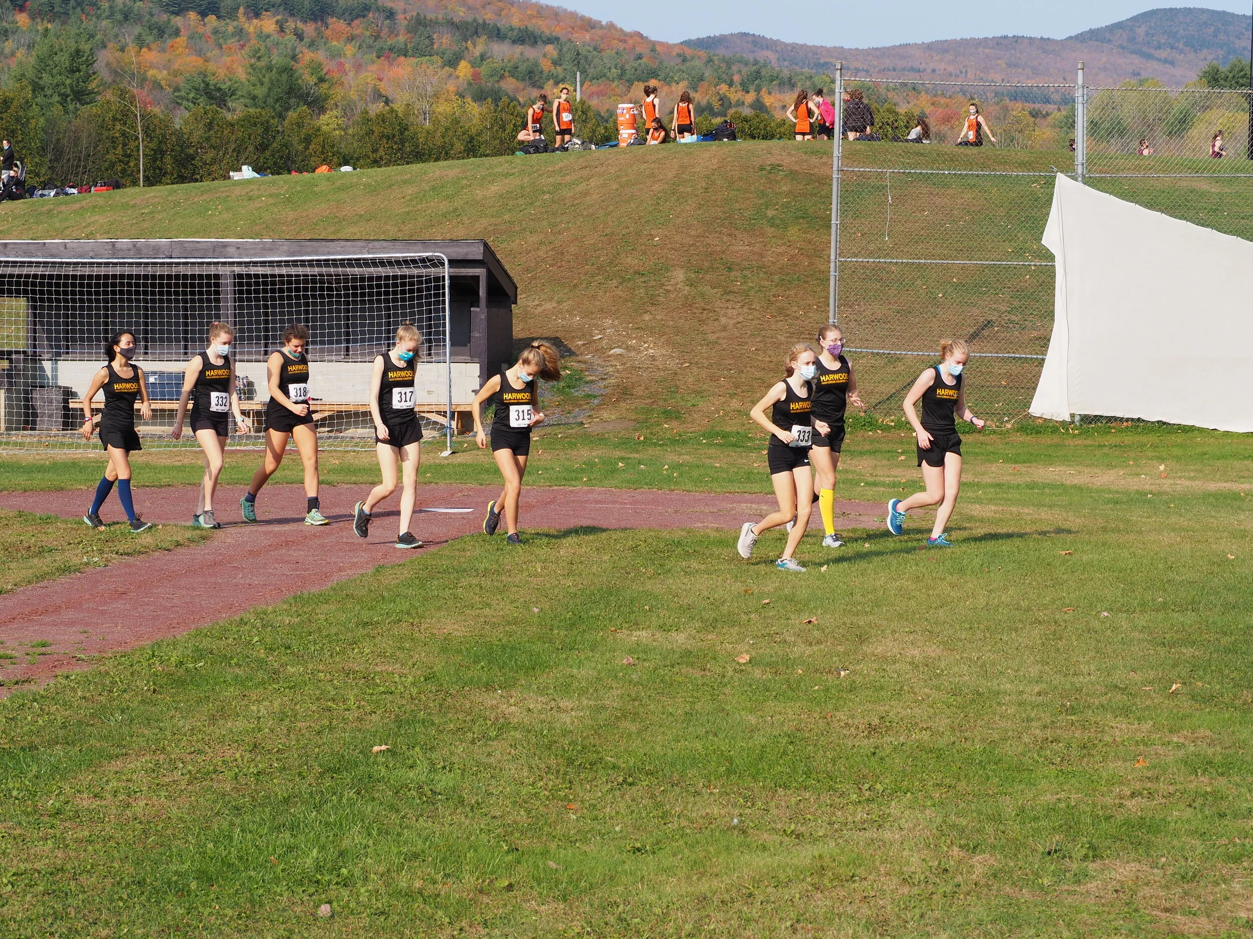   Varsity girls warm up. Photo by Ann Zetterstrom.  