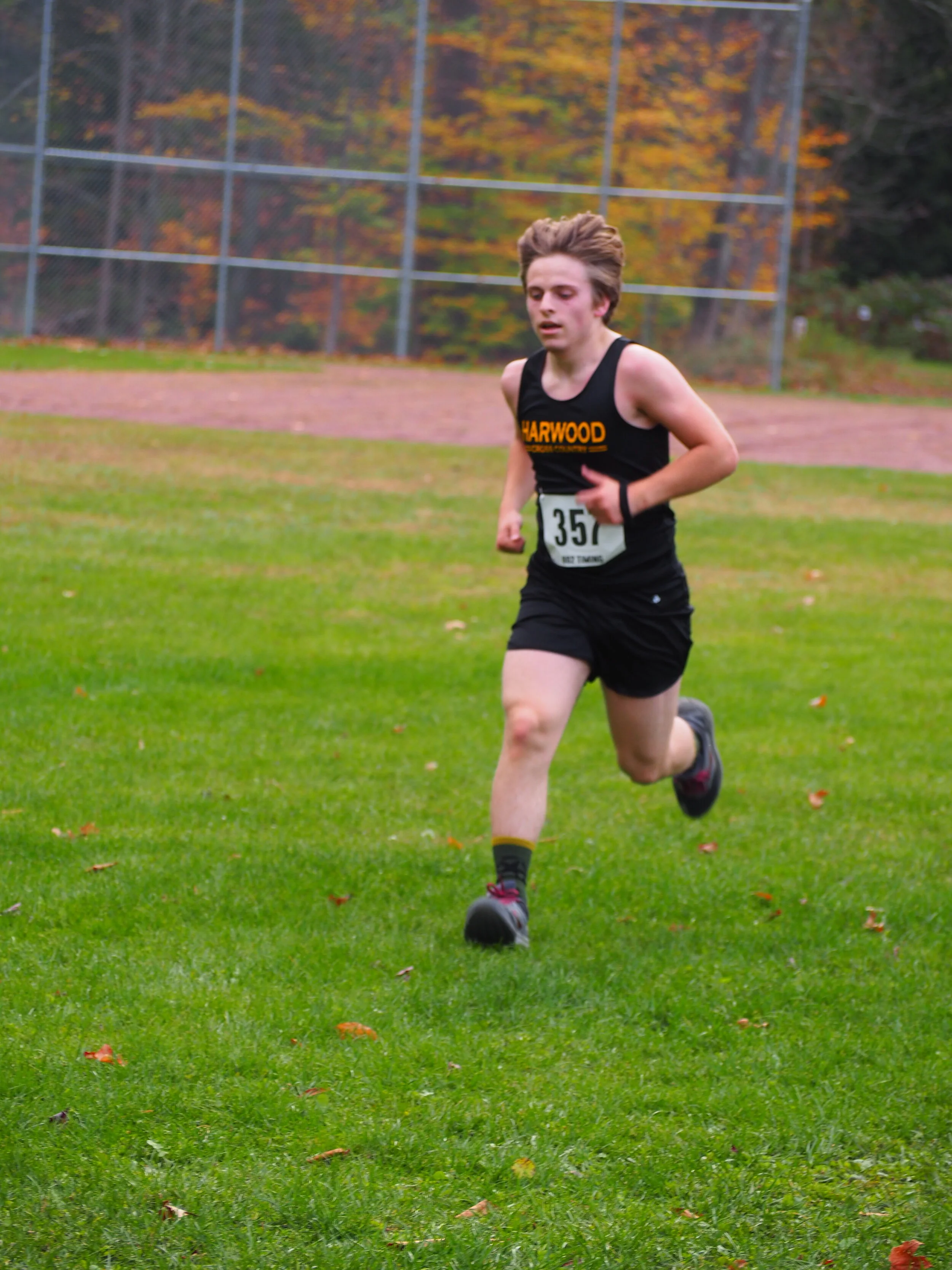   JV runner Ben White stays focused. Photo by Ann Zetterstrom.  