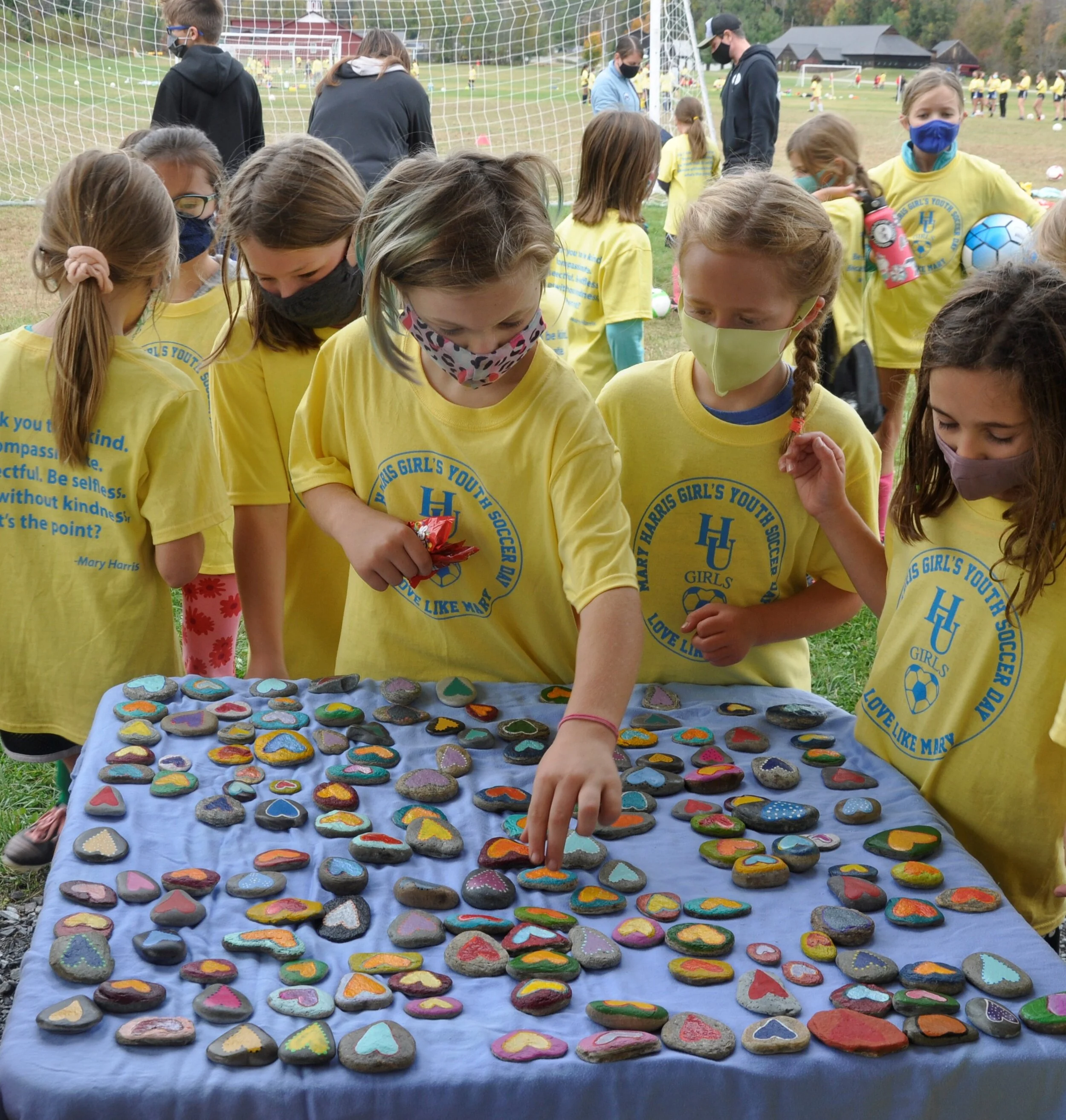   Choosing just one of the colorful painted rocks wasn't easy for many of the youngsters. Photo by Lisa Scagliotti.  