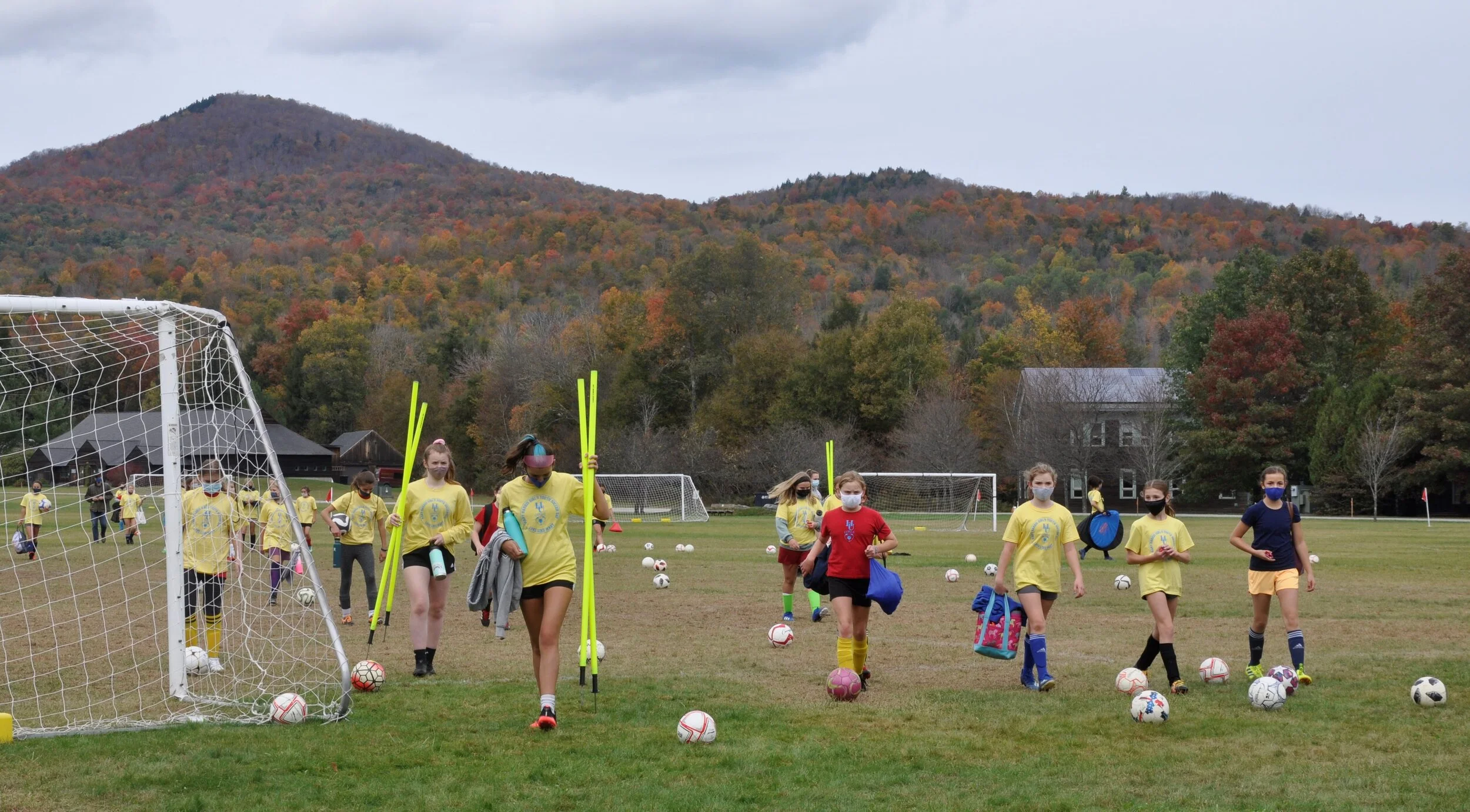   Fifth- and sixth-graders clear the field before the final session with 7-8 grade players. Photo by Lisa Scagliotti.  