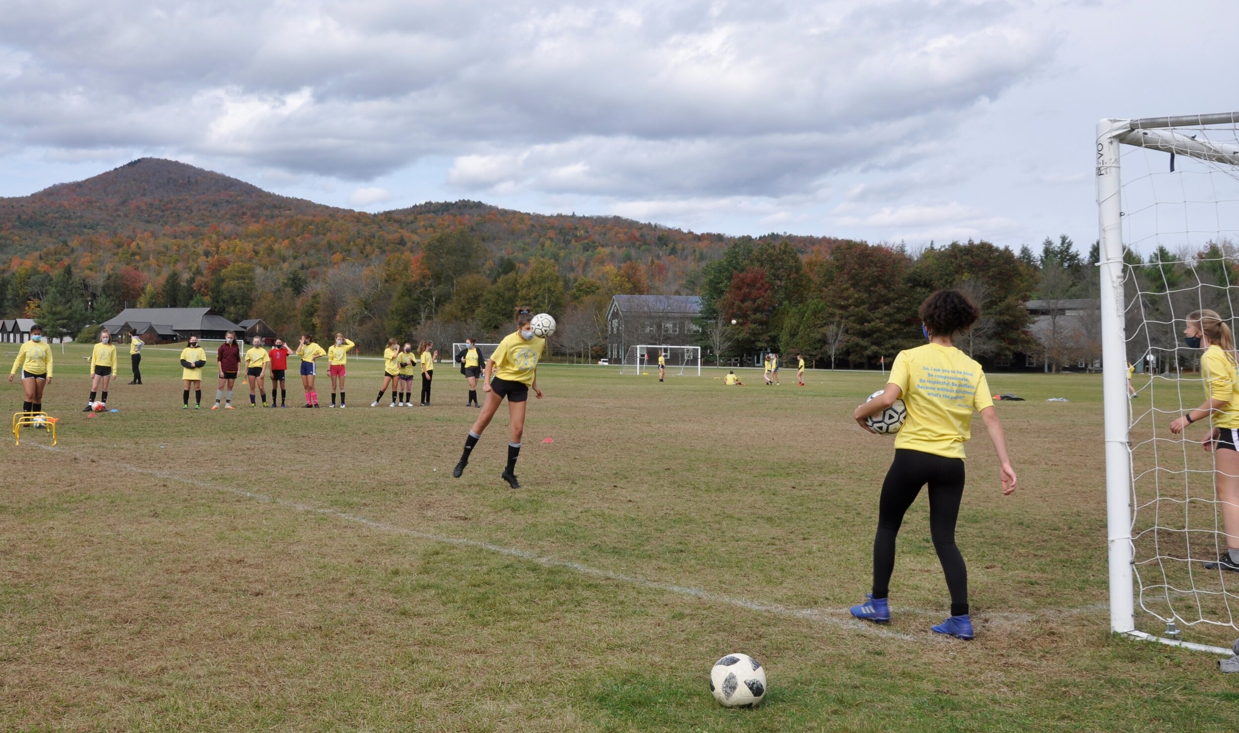   Eighth-graders get some intense drills with the high school players. Photo by Lisa Scagliotti.  