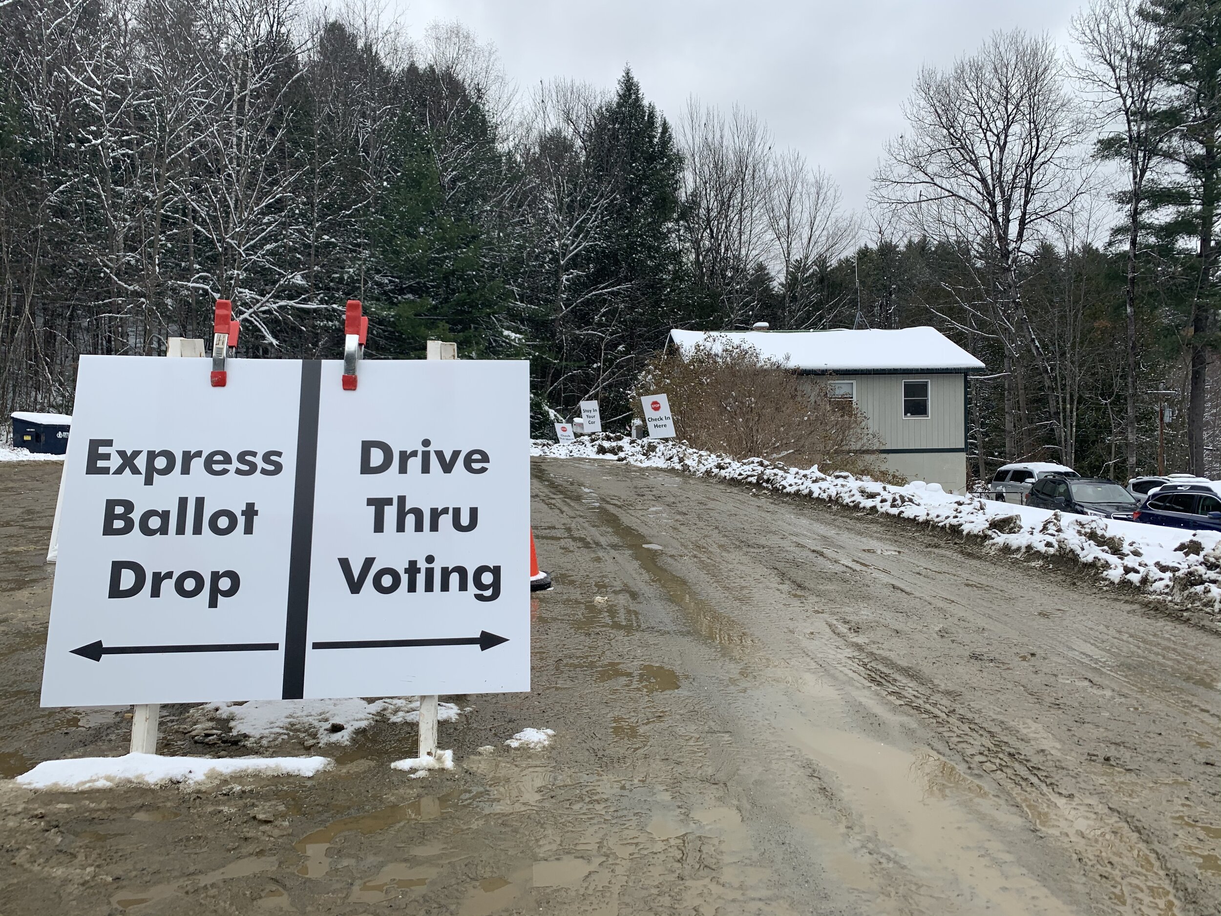   The area outside the Duxbury town office and garage looks like mud season Tuesday after early snowfall melts into mud for drive-thru voting. Photo by Lisa Scagliotti.  