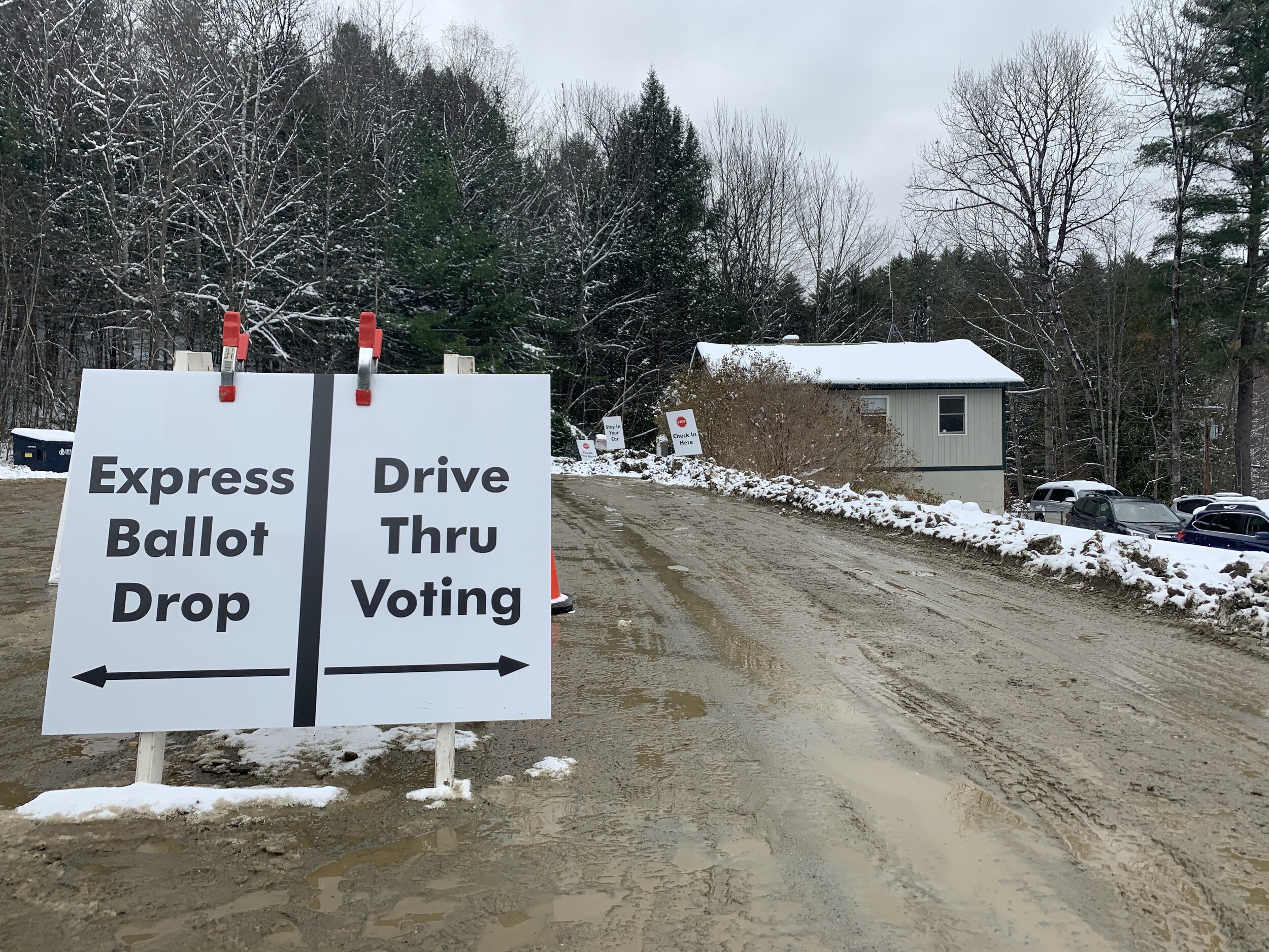 The area outside the Duxbury town office and garage looks like mud season Tuesday after early snowfall melts into mud for drive-thru voting. Photo by Lisa Scagliotti