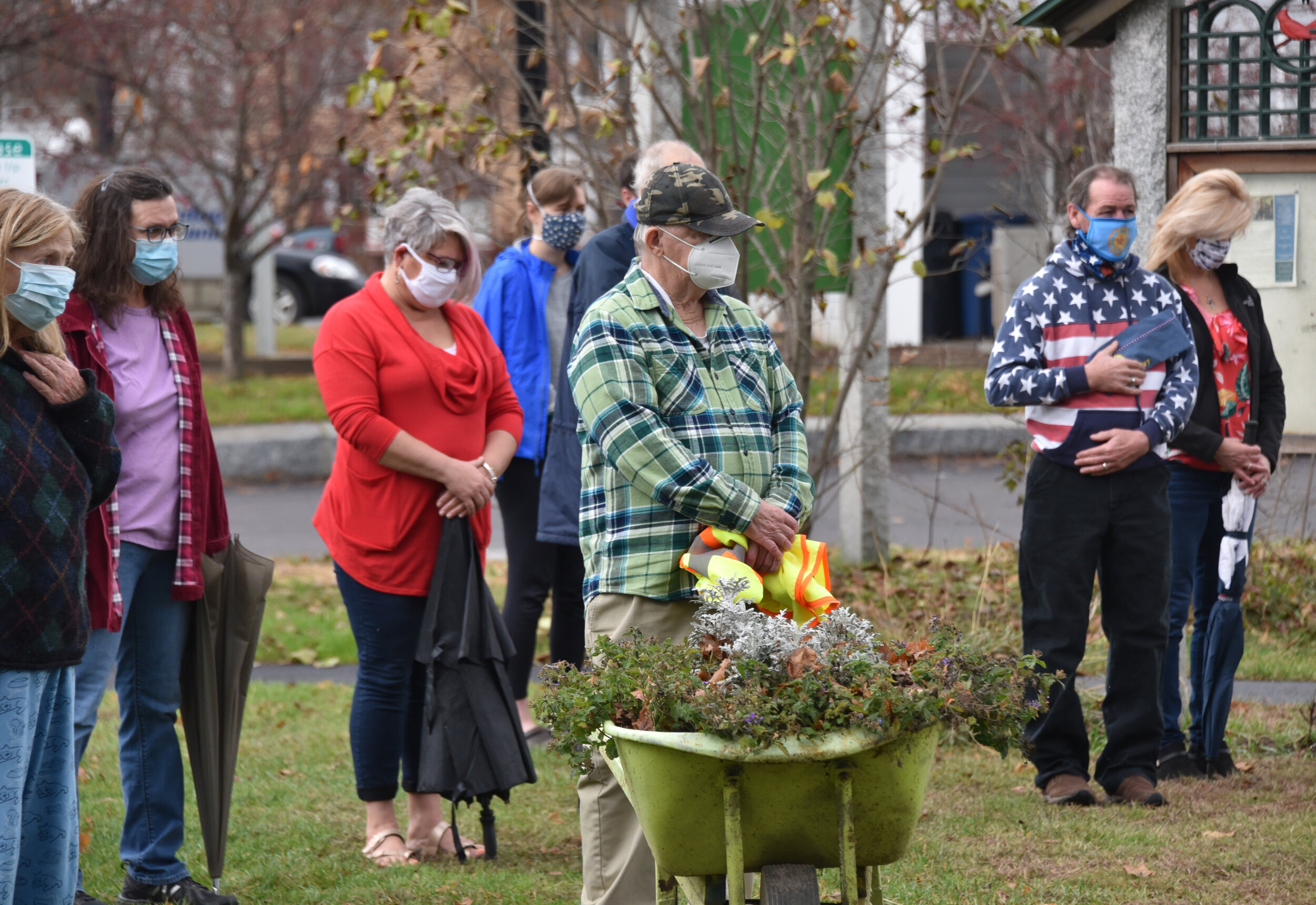   A couple dozen veterans, friends and family attended the outdoor ceremony wearing masks and keeping distance given the COVID-19 pandemic. Topo Despault (far right) is Sons of the American Legion Commander. Photo by Gordon Miller.  