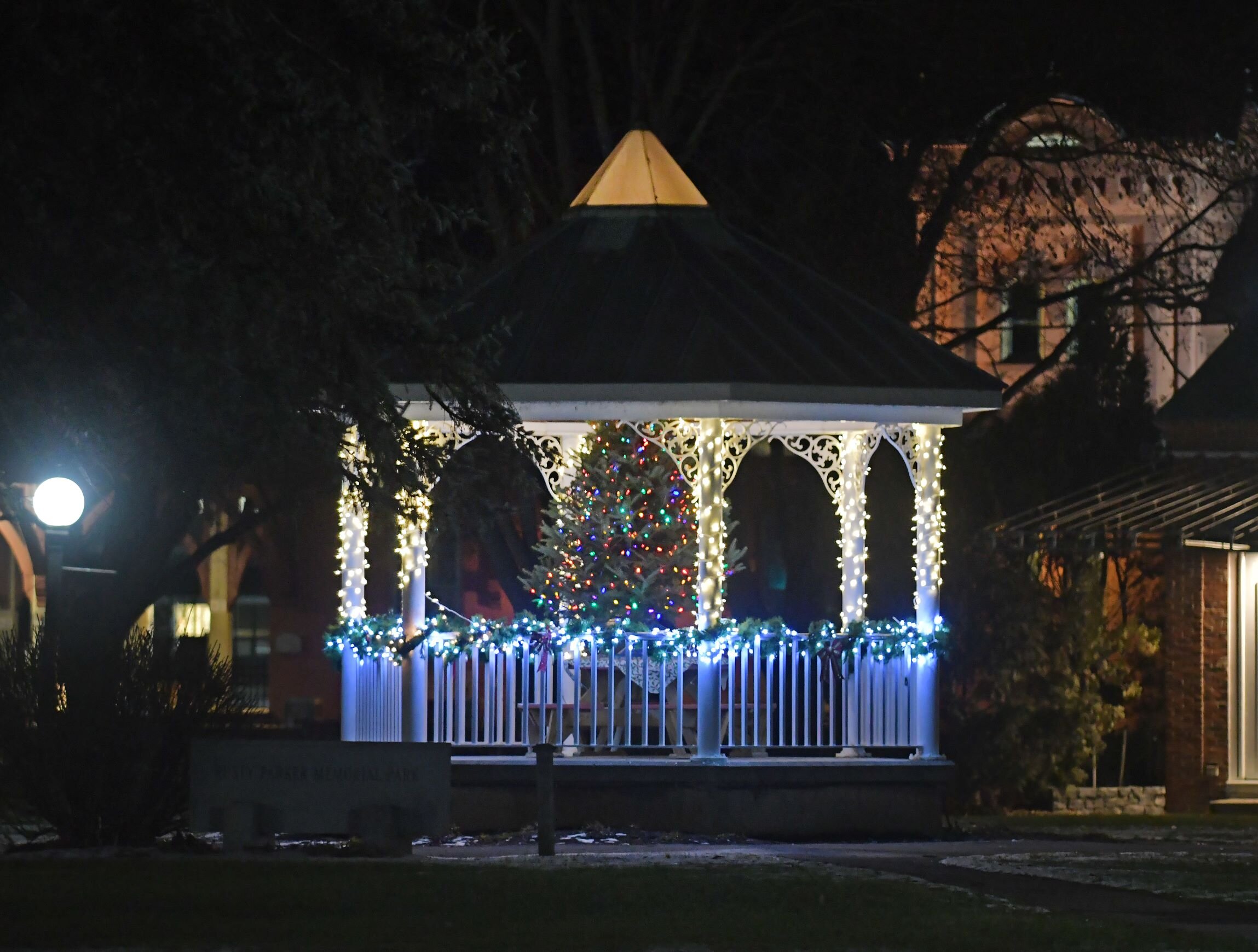  The gazebo bandstand at Rusty Parker Memorial Park is aglow this season with decorations by Waterbury Rotary and a tree donated by the Murray Hill Tree Farm. Photo by Gordon Miller.  