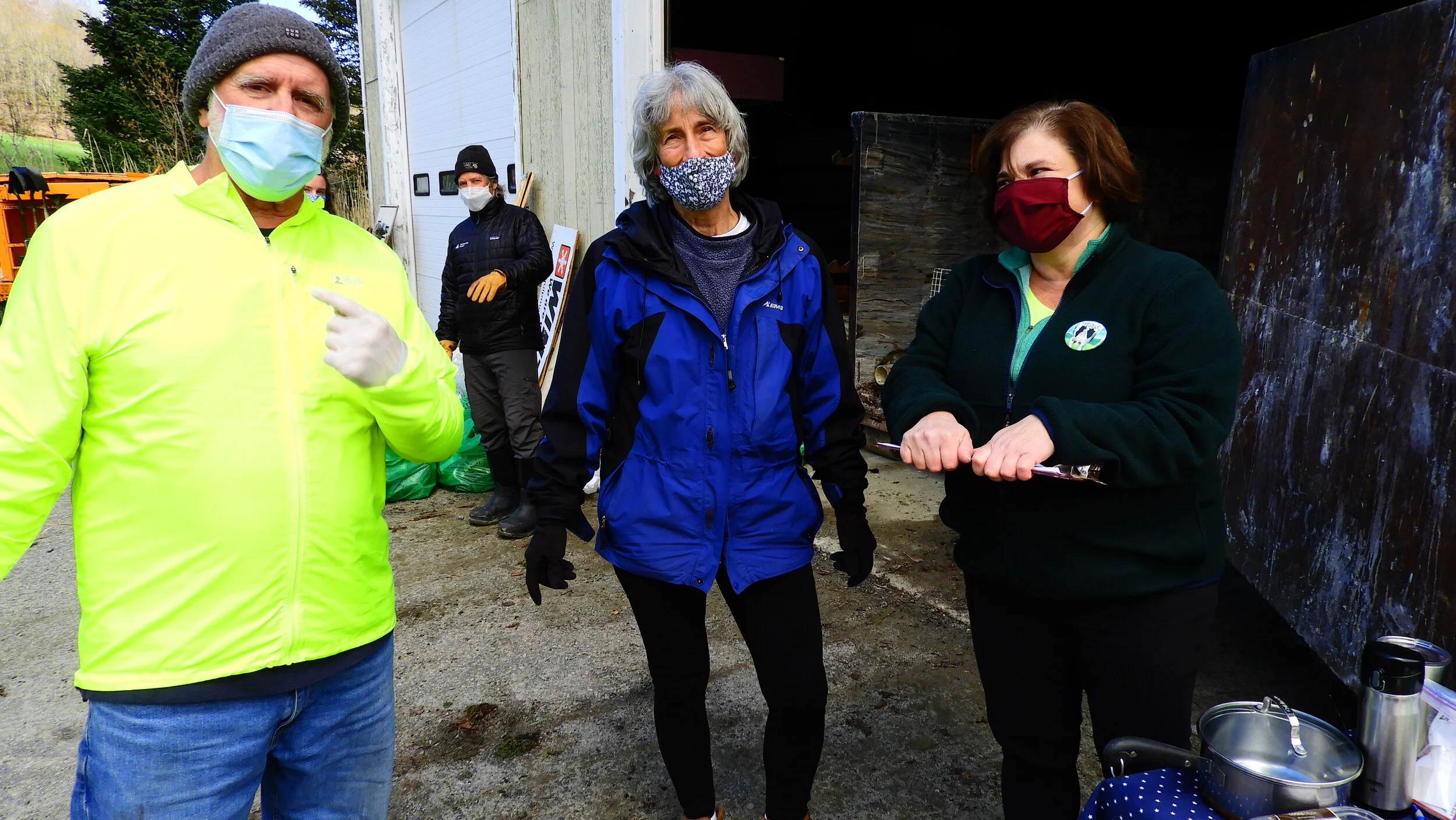  After a successful collection and drop-off, Don Schneider visits with Green Up organizers Kit Walker and Lisa Scagliotti. Photo by Rob Hoffmann. 