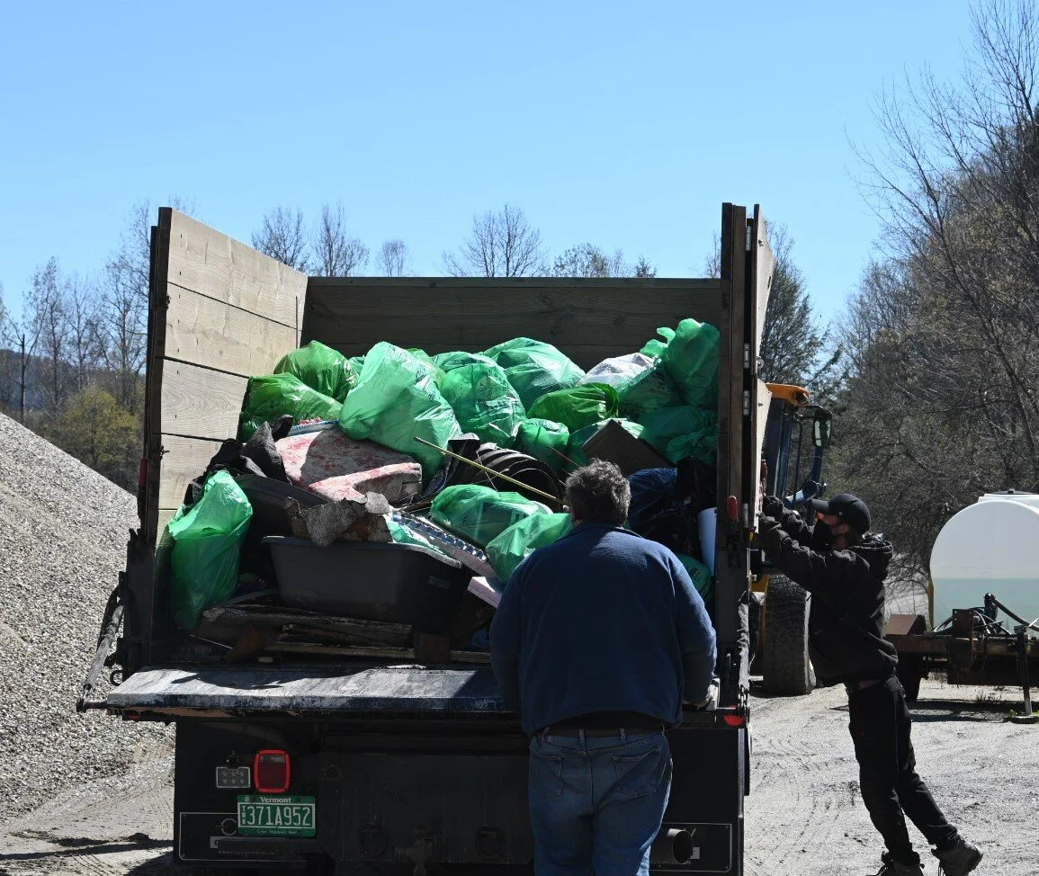  Rodney Companion arrives to combine the downtown collection into the main trash container. Photo by Jenny Koppang. 