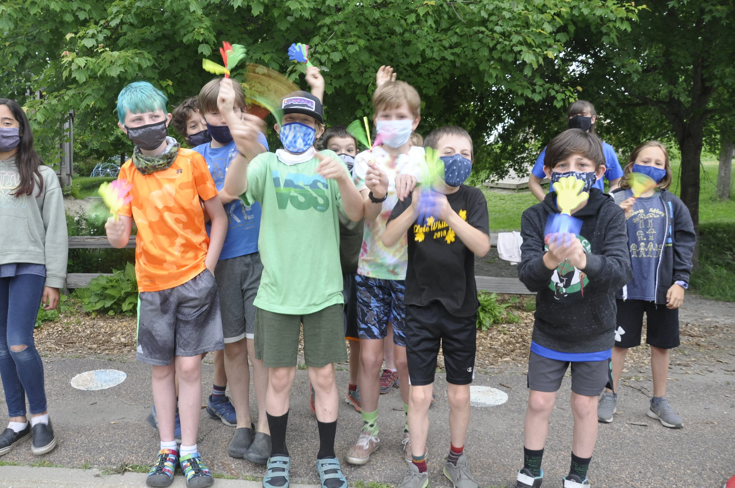  Last-day-of-school excitement bubbles over along the sidewalk. Photo by Lisa Scagliotti 