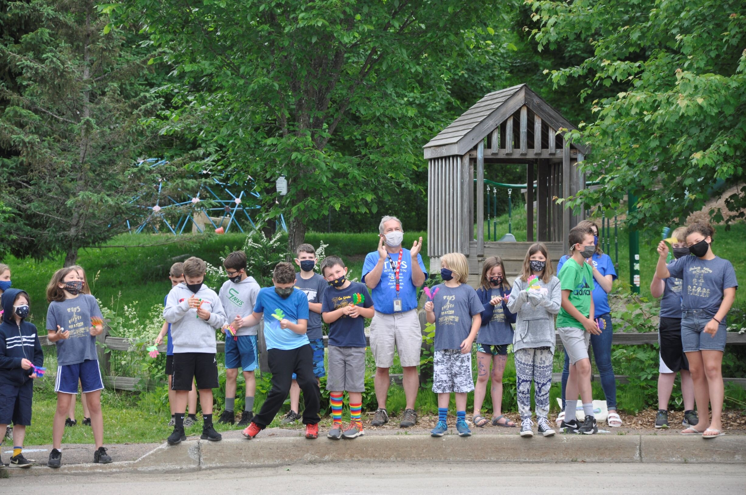  Teacher Chris Costello with some of the finishing fourth graders. Photo by Lisa Scagliotti 