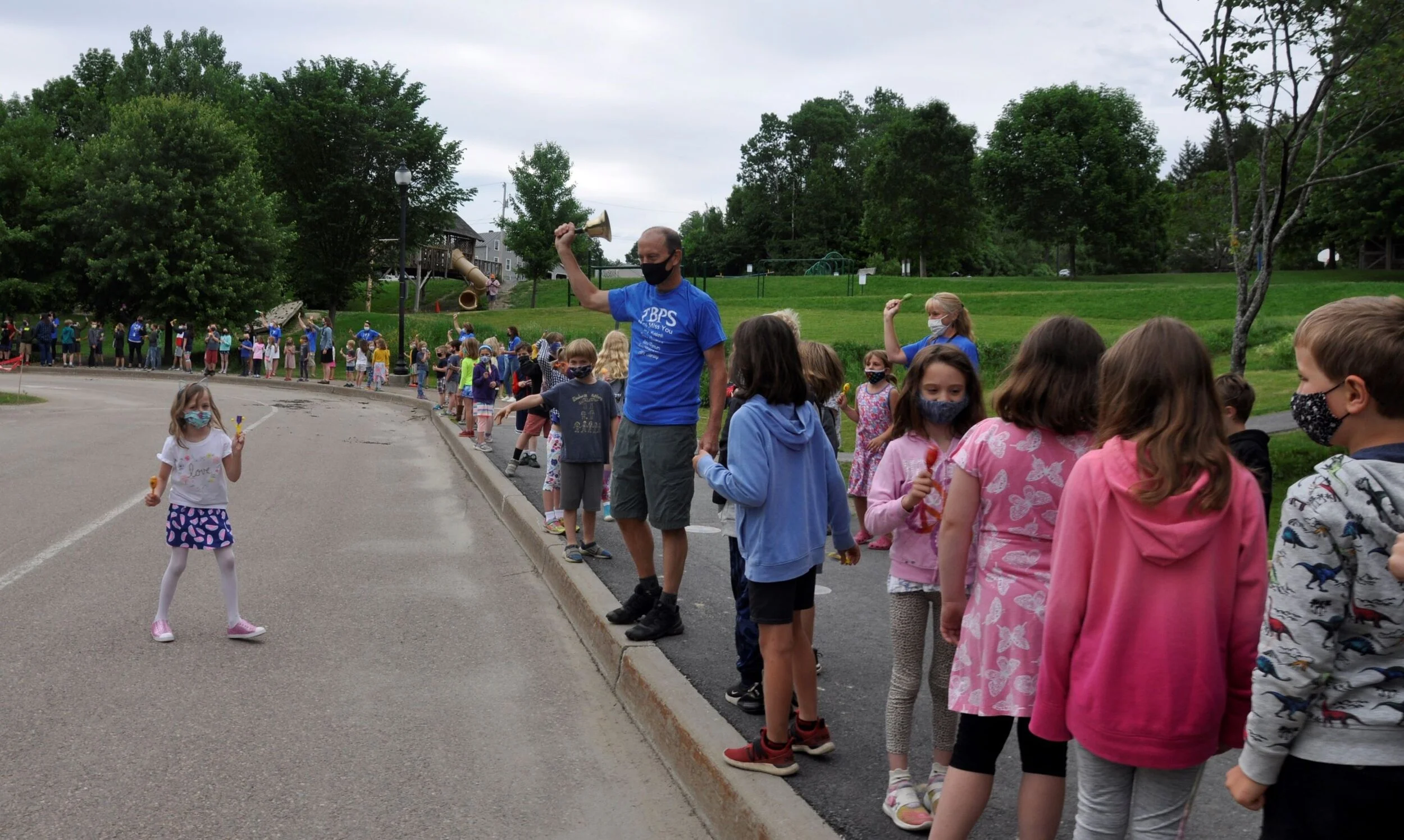  Teacher Tom Thurston rings the largest handbell. Photo by Lisa Scagliotti 