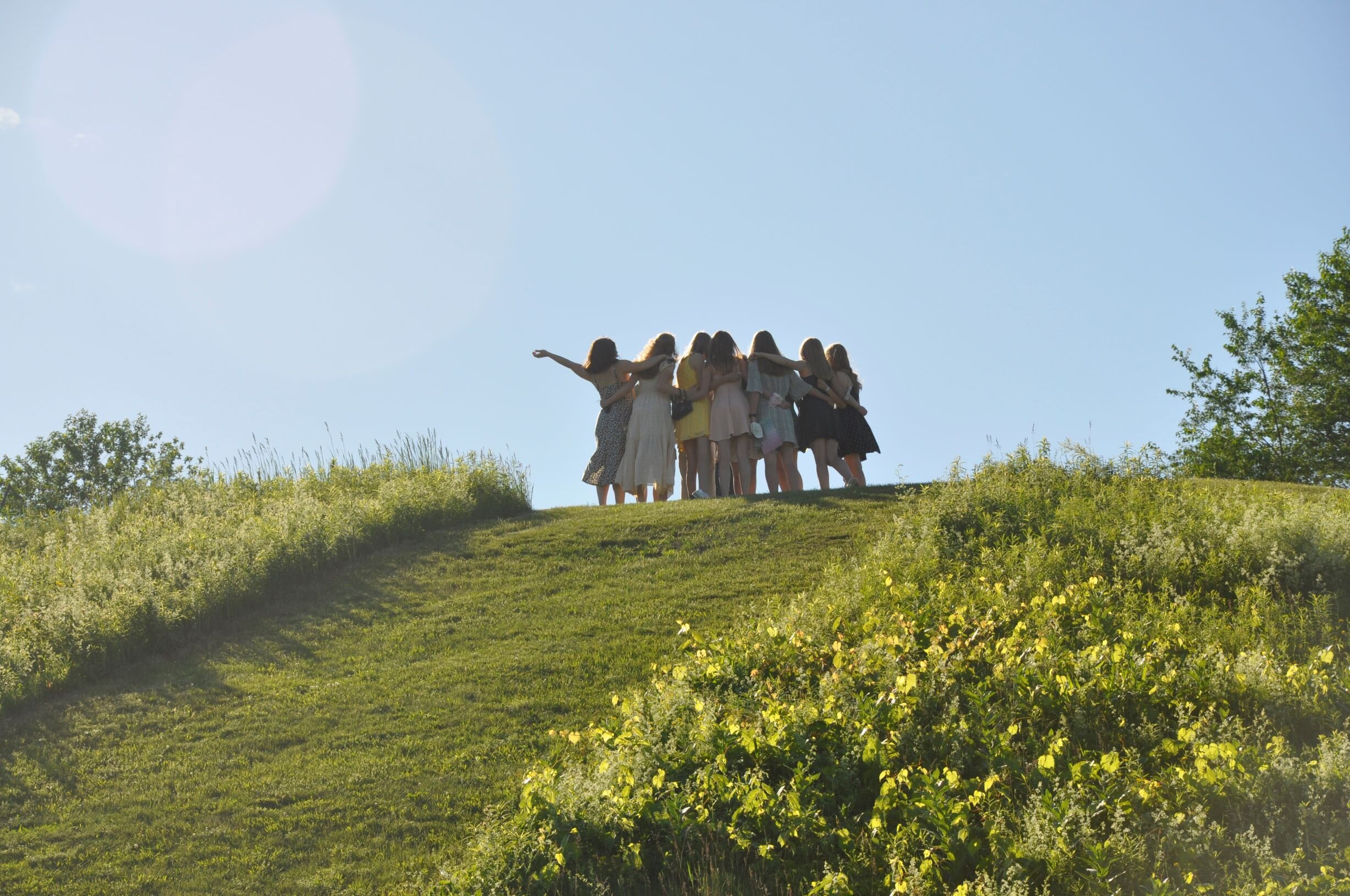   The sledding hill as graduation photo op. Photo by Lisa Scagliotti.  
