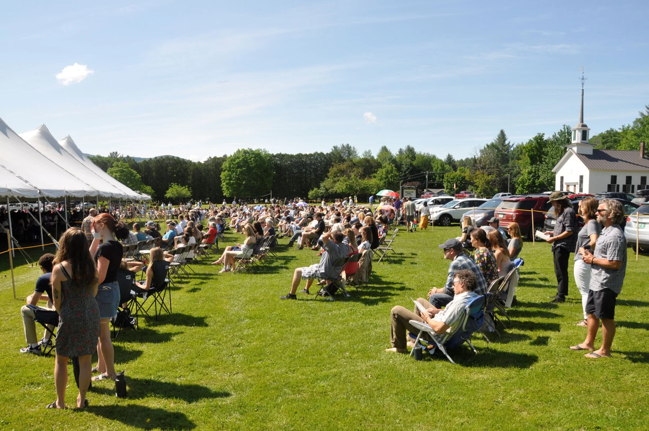  Those outside the tent on the lawn spread out in family groups. Photo by Lisa Scagliotti 