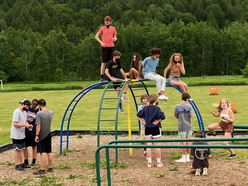  One last chance to play on the middle school playground together. Photo by Kelley Hackett 