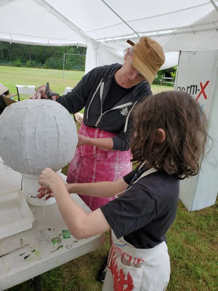  Working on an art project outdoors to get ready for a parade is part of summertime fun in Waterbury. Photos courtesy Mame McKee 