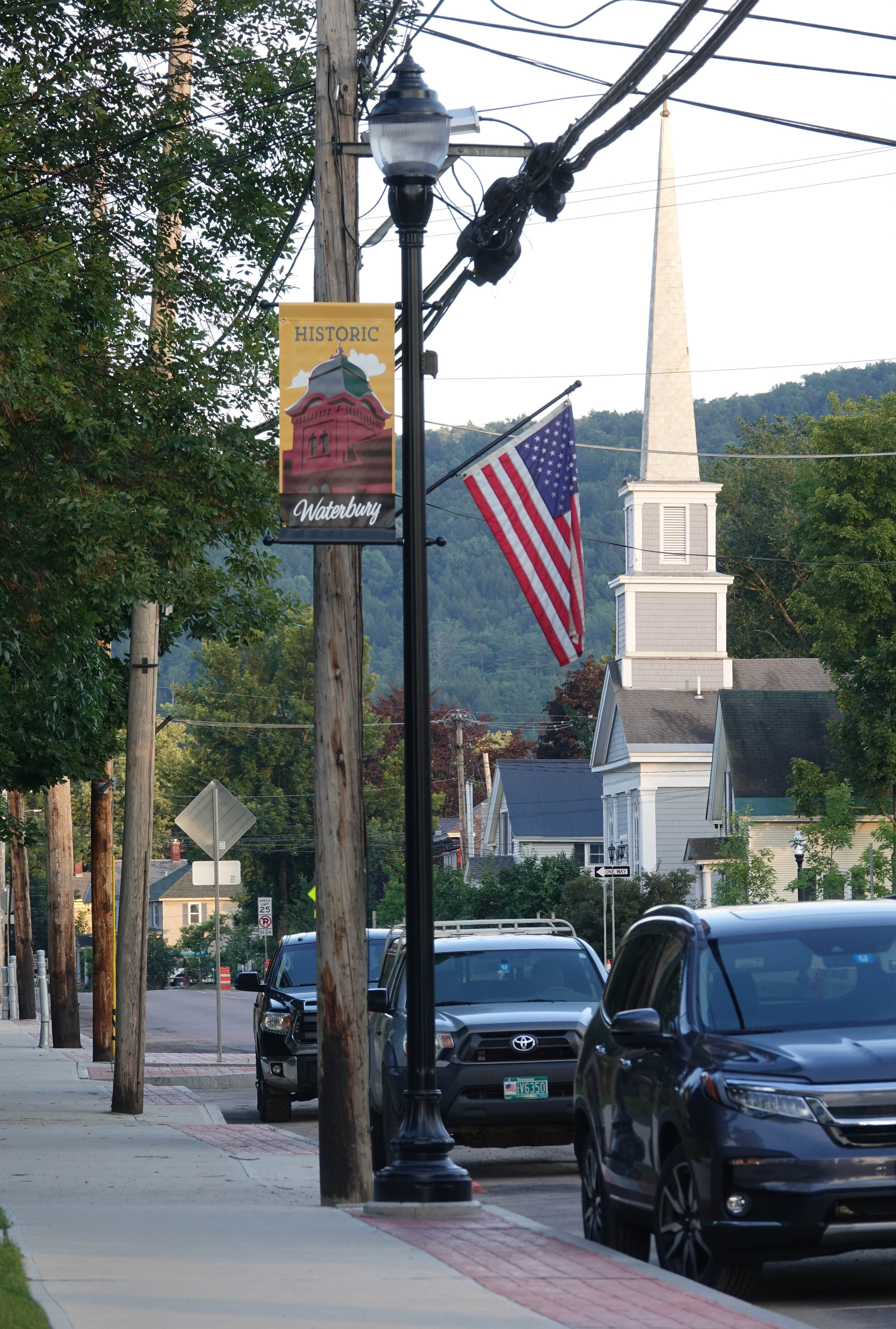   New street lights have hangers for banners and flower baskets. Photo by Gordon Miller  