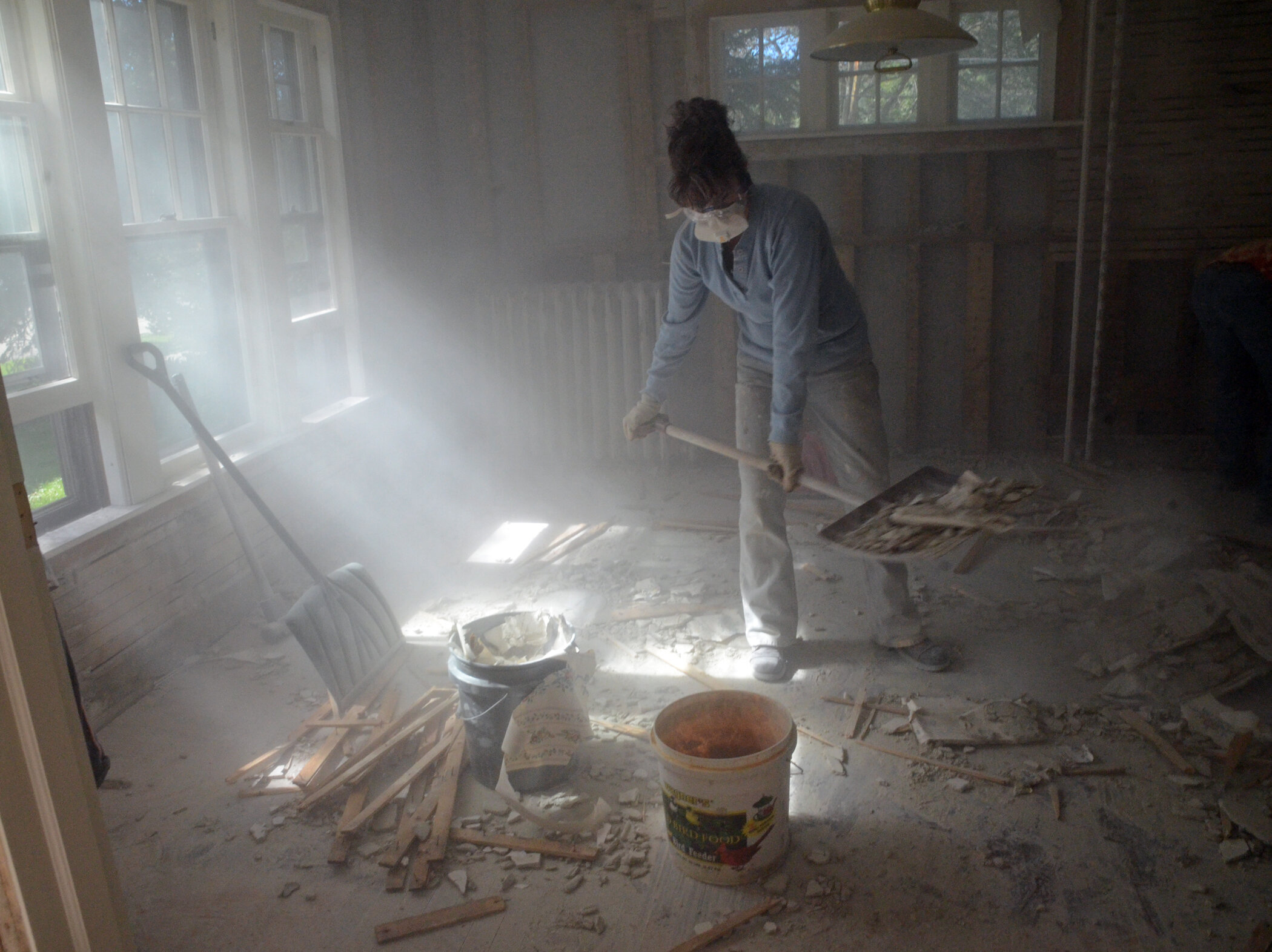  In the days following Irene, people worked around the clock to clear dried mud and dry out buildings in a battle to prevent mold. Photo by Gordon Miller  