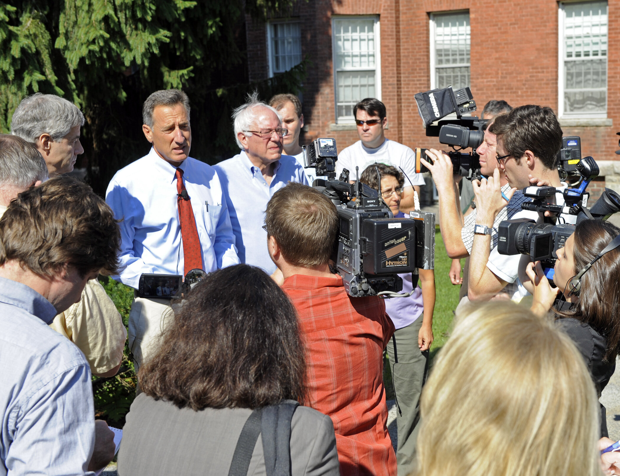  Meeting reporters outside the State Office Complex which was closed, its 1,000+-member workforce displaced by Irene. Photo by Gordon Miller 