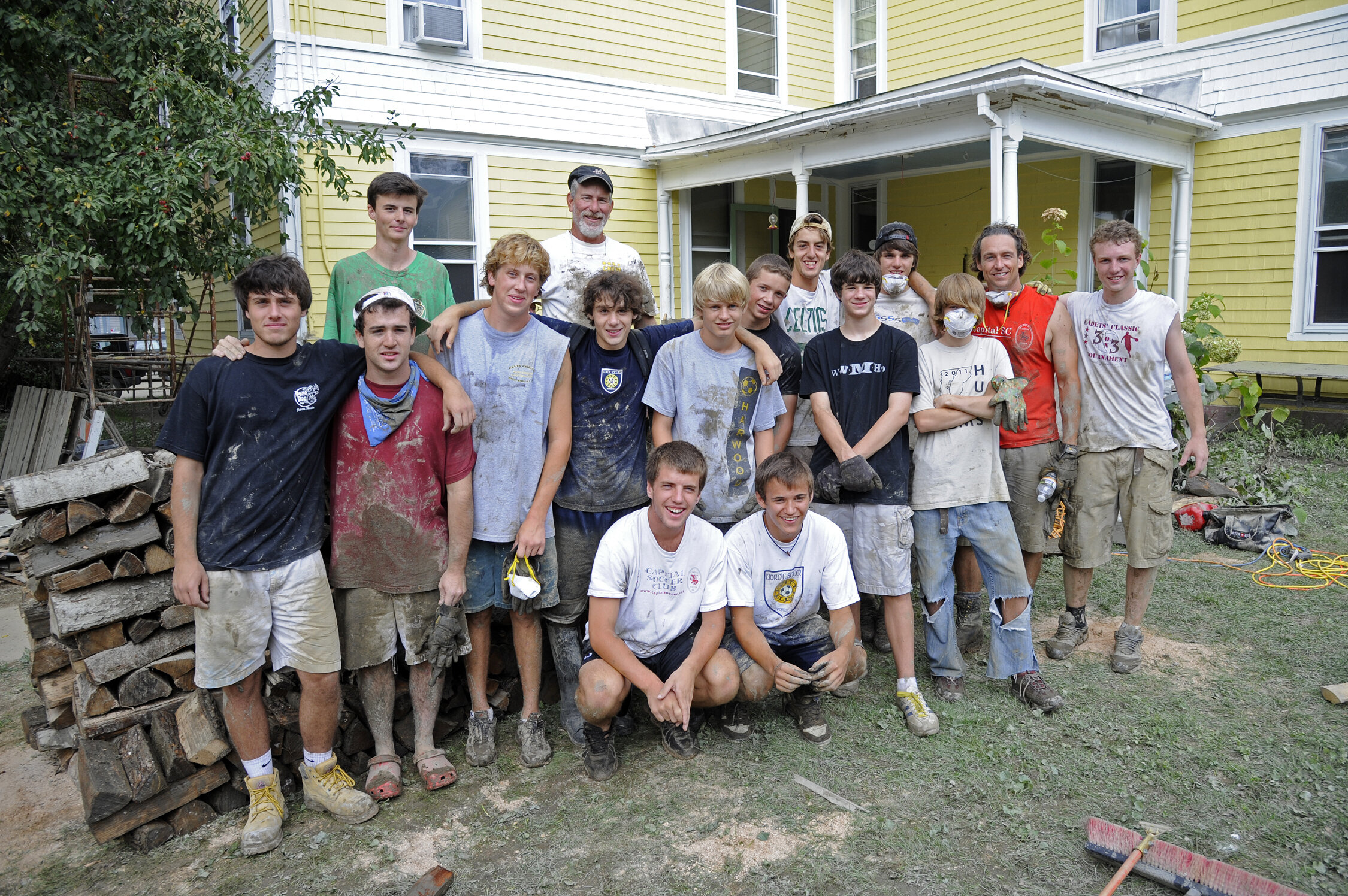  The Harwood Boys Soccer team takes a break from soccer to work in the flood zone. Photo by Gordon Miller 