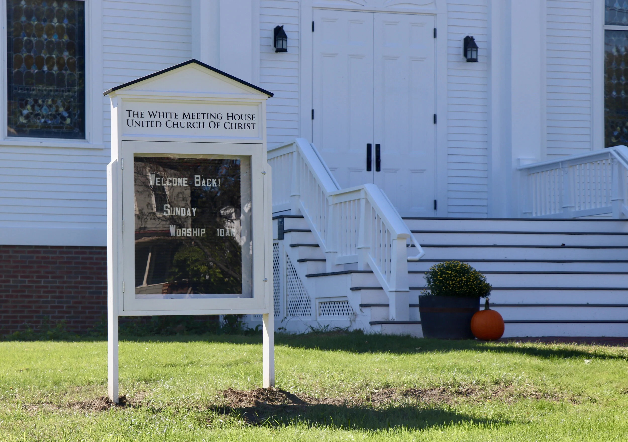   A new sign erected on the front lawn acknowledges the church's history. Photo by Megan Schneider  