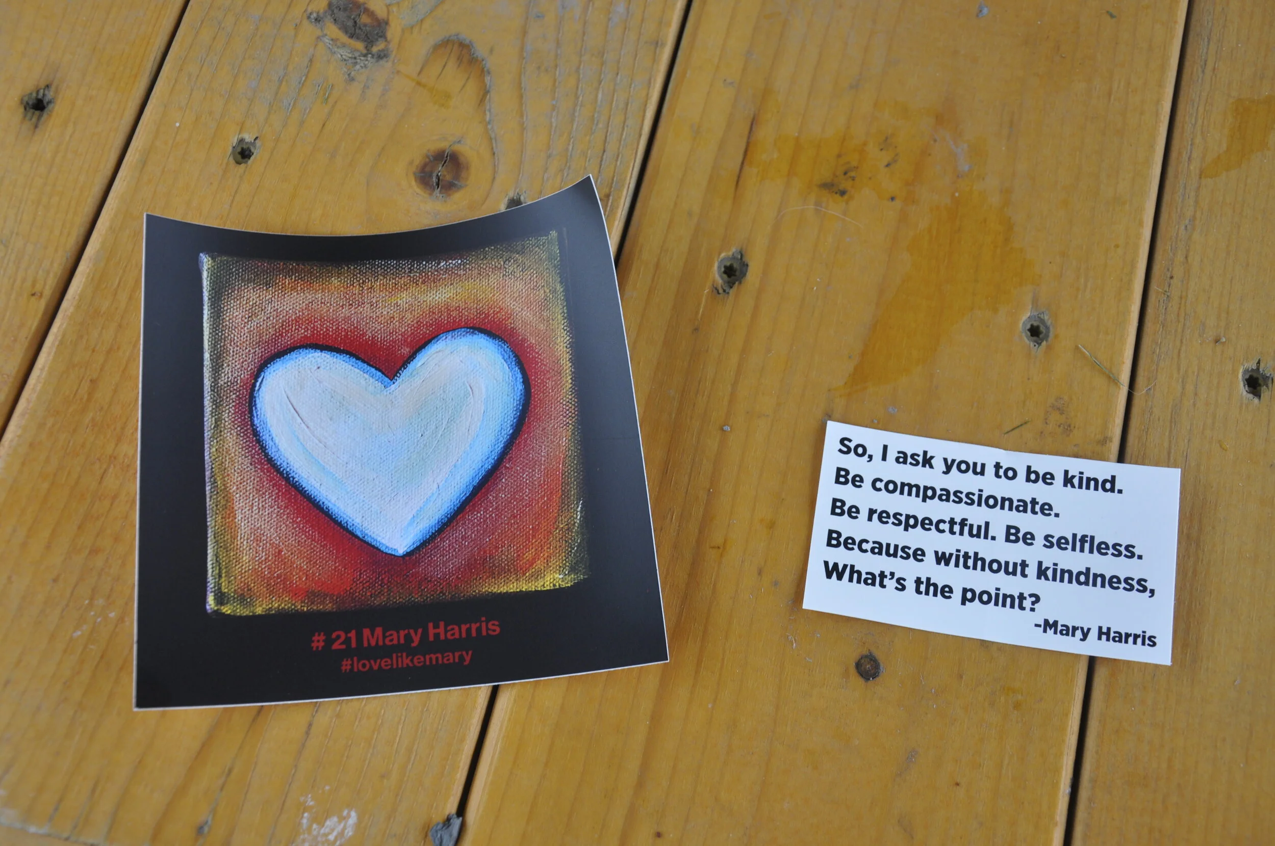  Liz Harris' design on stickers and smaller ones with a quote from Mary Harris. Photo by Lisa Scagliotti 