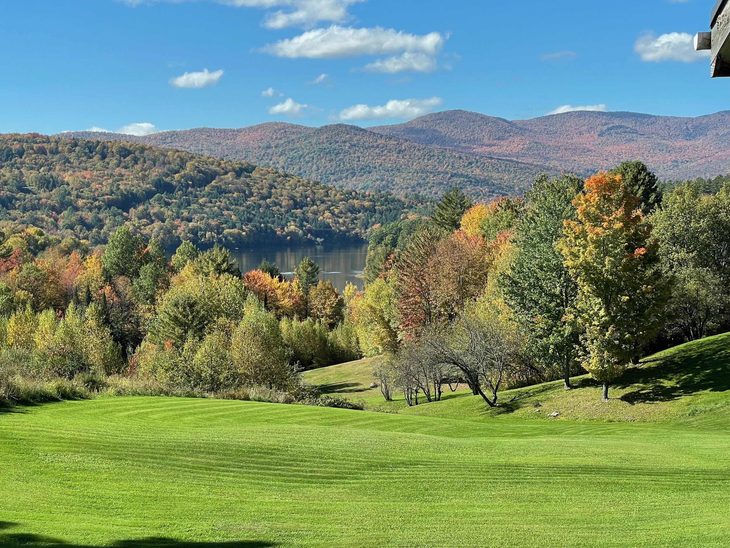   The Waterbury Reservoir peeks out in this view from Sunset Drive in Waterbury Center. Photo by Andrea Barber  