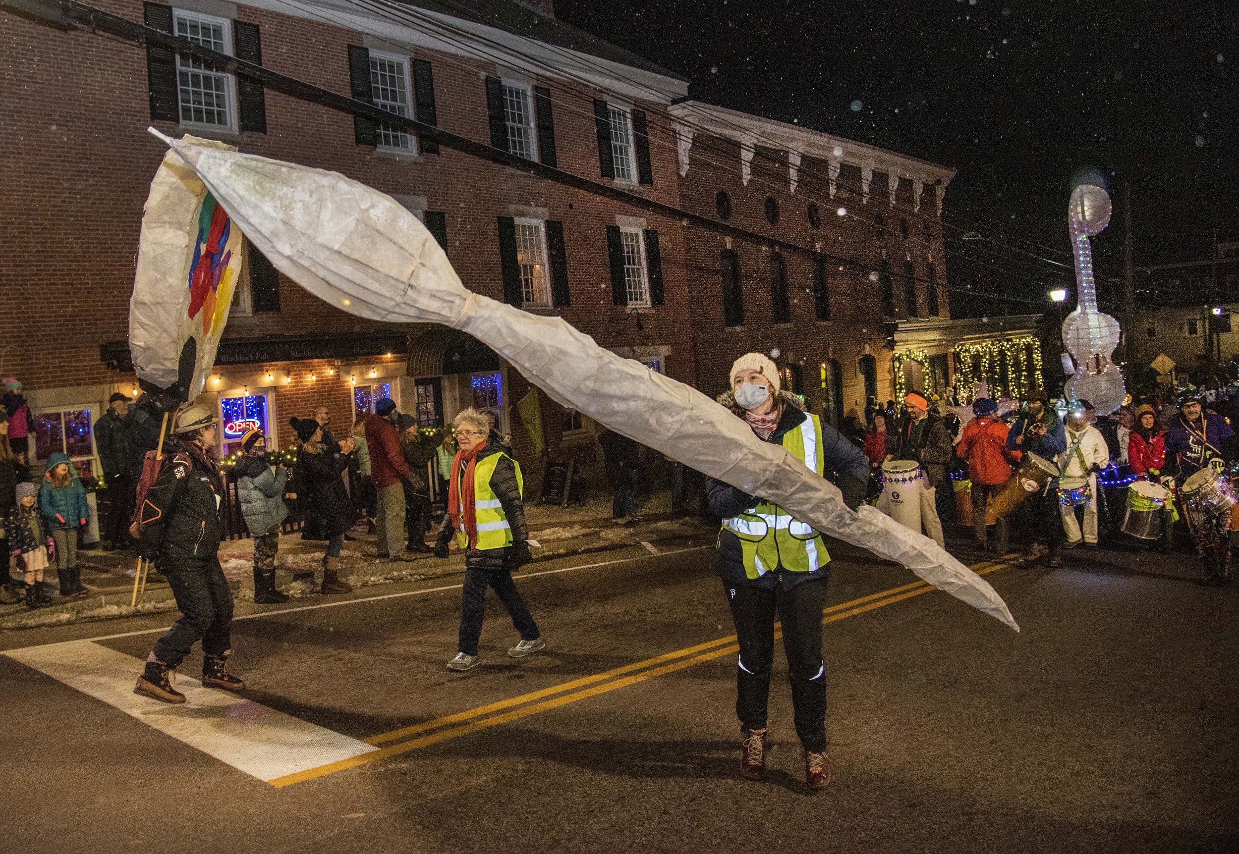   Parade organizers and art teachers lead the parade up Bank Hill. Left to right: Mame McKee and MK Monley from MakerSphere and Brookside Primary School art teacher Rachel Wells. Photo by Gordon Miller  