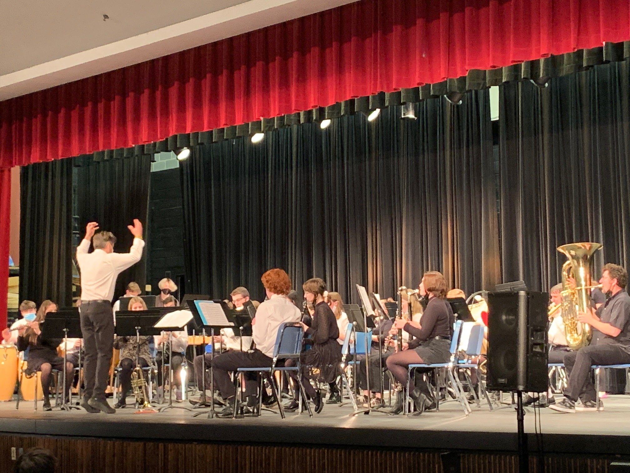   Chris Rivers conducts the Concert Band. Photo by Lisa Scagliotti  