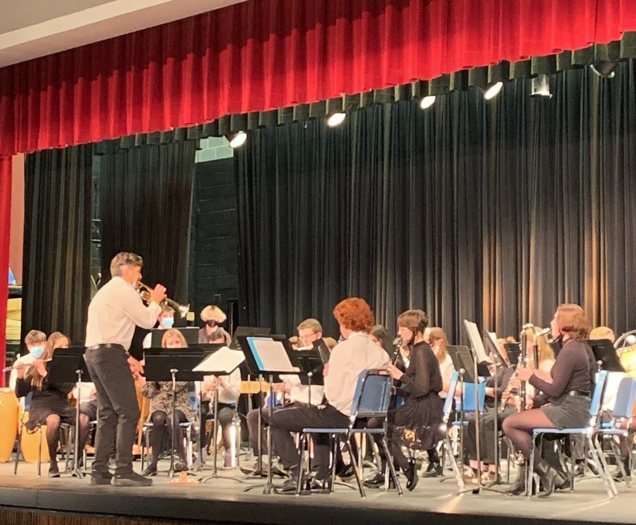   Band Director Chris Rivers joins in as the only trumpet player. Photo by Lisa Scagliotti  