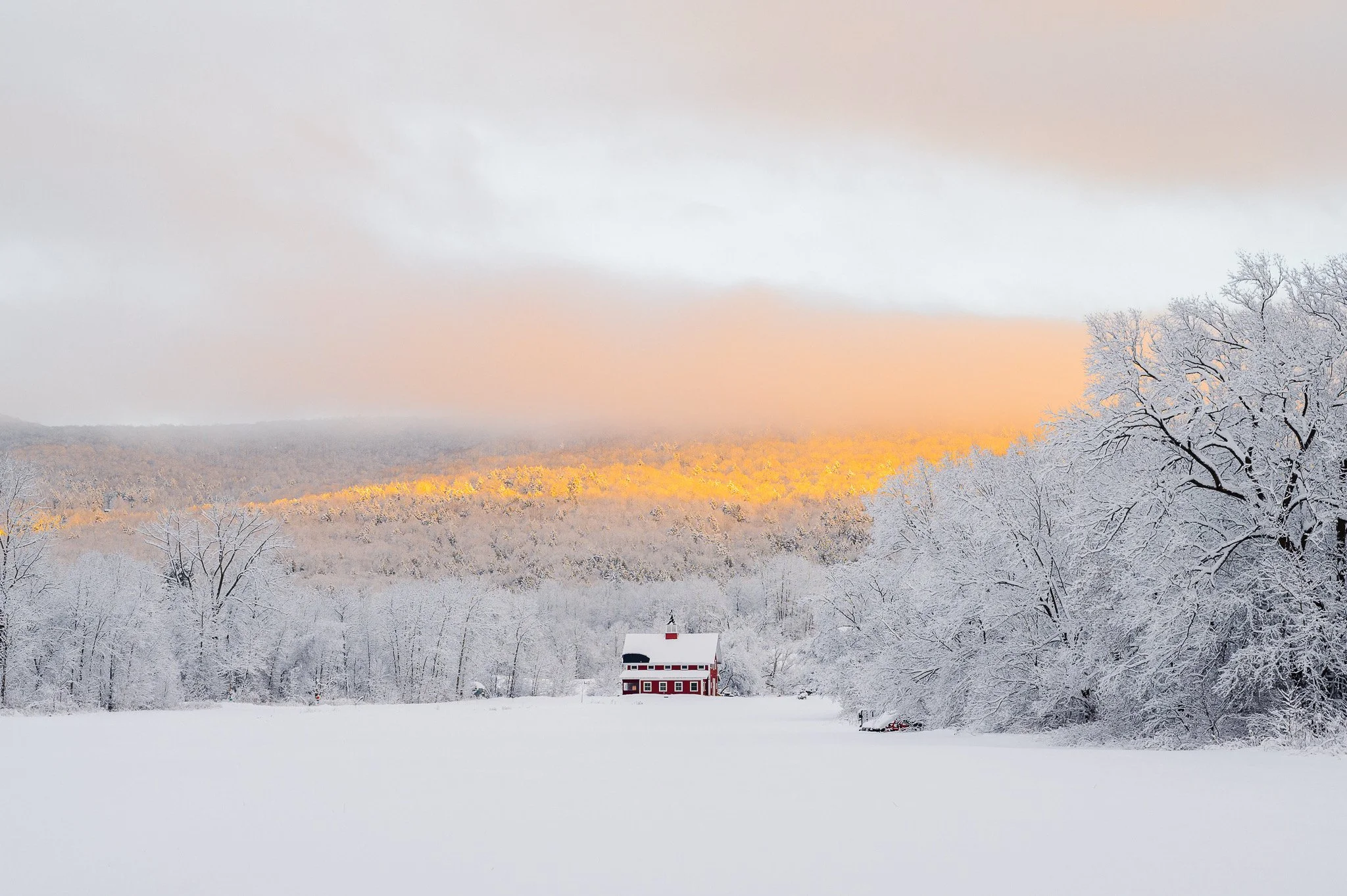   Afternoon glow on new-fallen snowy hills in Waterbury Center. Photo by Nicholas Erwin  