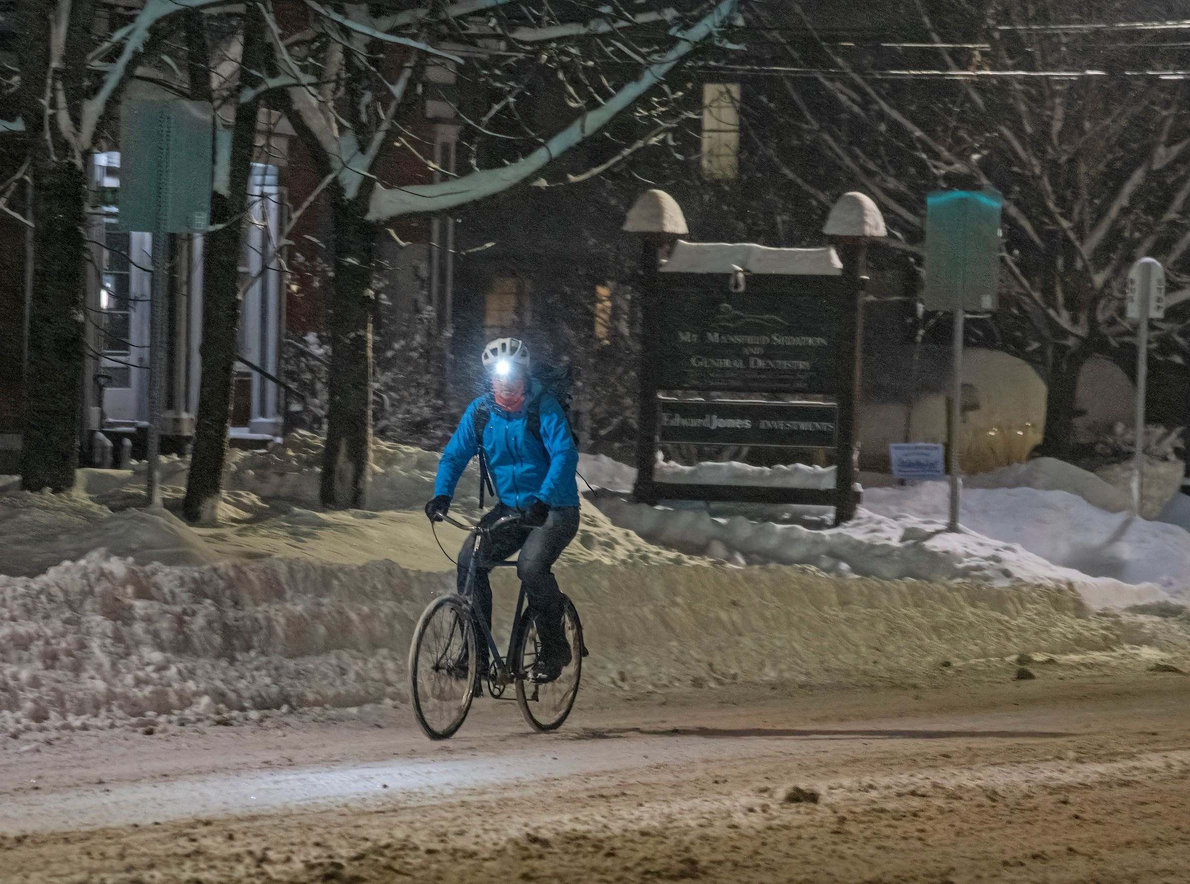  A lone biker makes their way down Main Street Monday night. Photo by Gordon Miller 