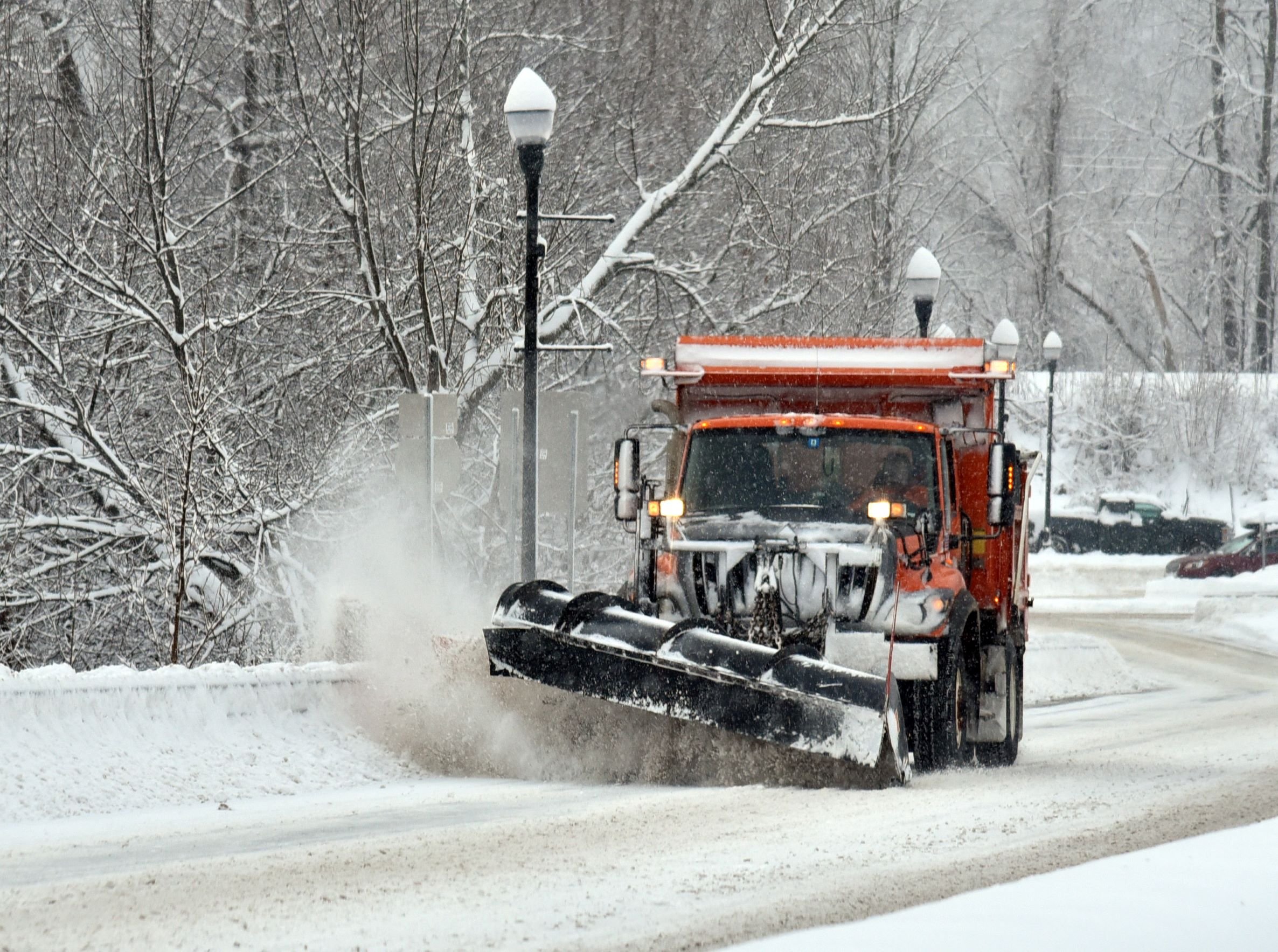 A VTrans plow takes a pass just above the roundabout heading towards the Interstate-89 ramps. Photo by Gordon Miller 