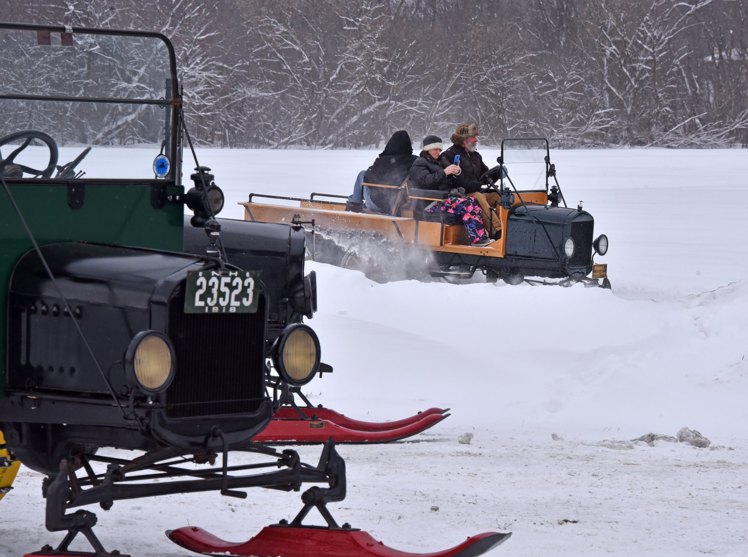  The visiting snowmobilers gave rides during the day. Photo by Gordon Miller  