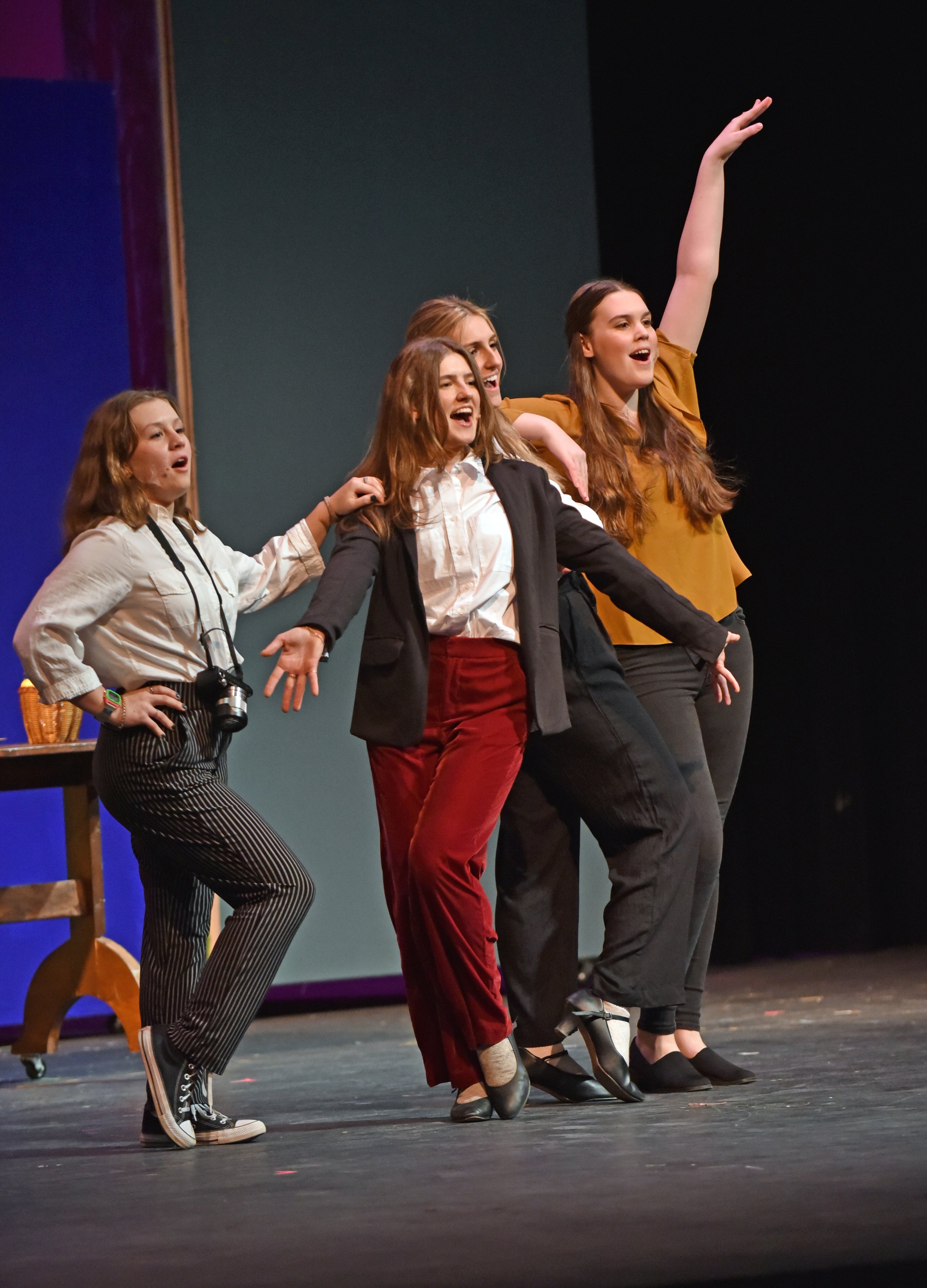  Eliana Buckingham, left, in one of her roles as wedding photographer, for Katherine’s played by Wanda Sullivan (center) upcoming ceremony. Photo by Gordon Miller  