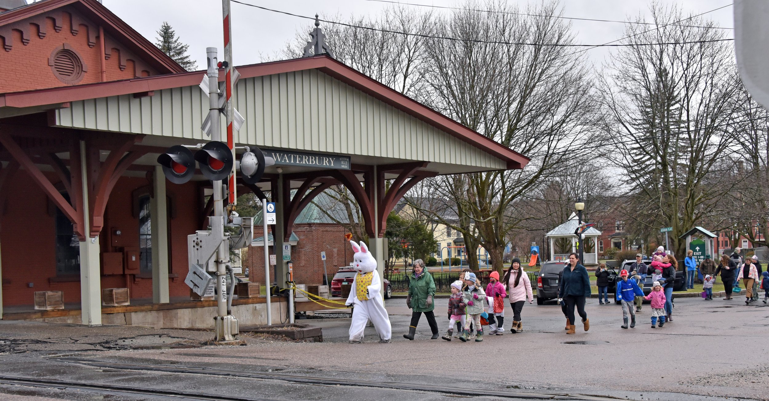  The parade passes the Waterbury Train Station as it heads to Pilgrim Park.  Photo by Gordon Miller 