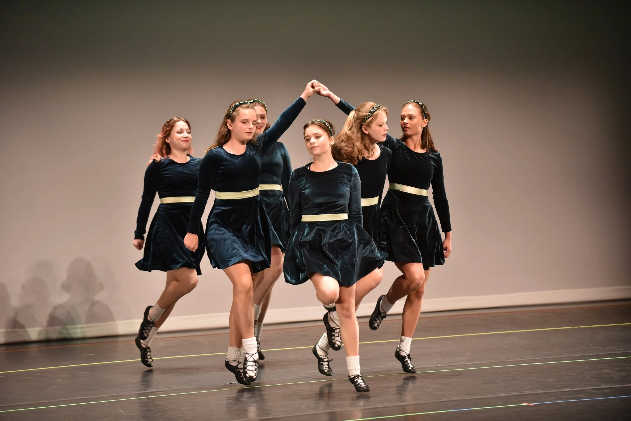  Advanced Irish dancers perform softshoe to “Eric and the Angels and Jenny’s Welcome to Charlie.” Photo by Gordon Miller 