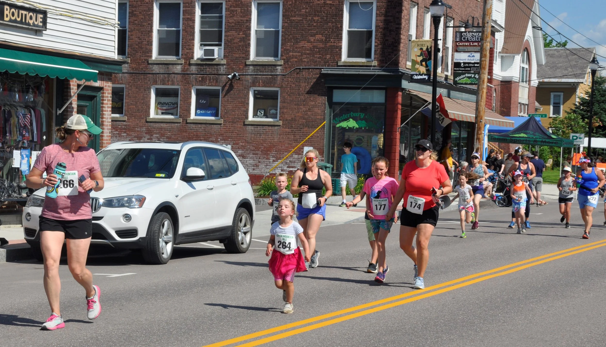  Maria Fischer checks on 4-year-old Julia who’s in her zone. Photo by Lisa Scagliotti 